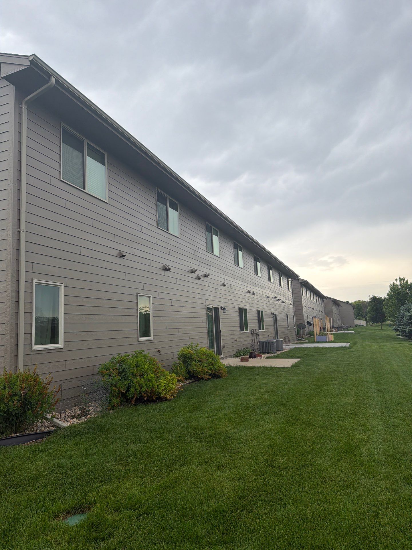 Multi-Family Exterior Painting and Trim Refresh in Sioux Falls by Select Painting, Coatings & Garage Cabinets