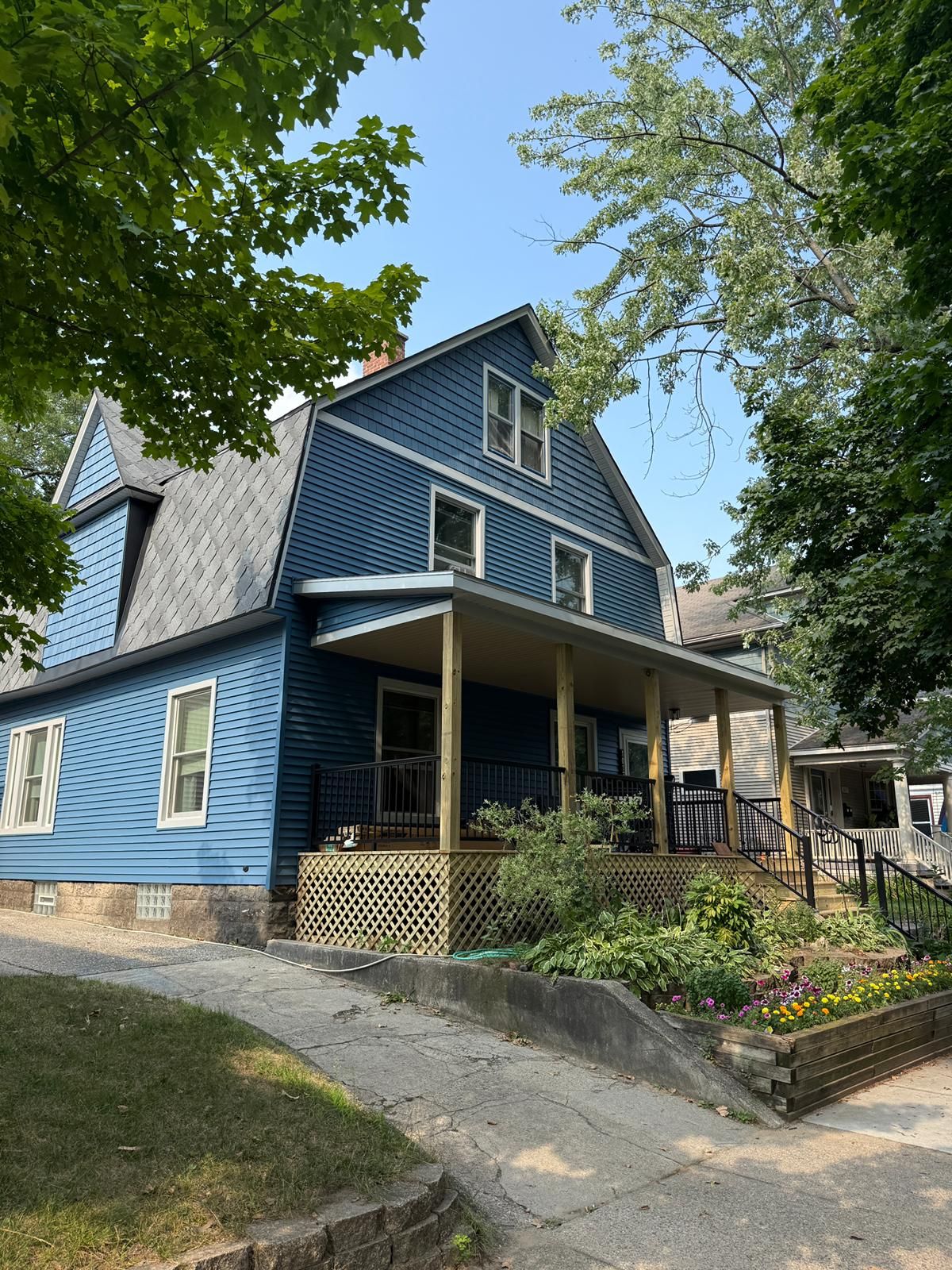 SIDING, DECK AND NEW PORCH  by Avalon Roofing and Exteriors