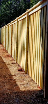 Fence Installation of Board on Board Capped Privacy
