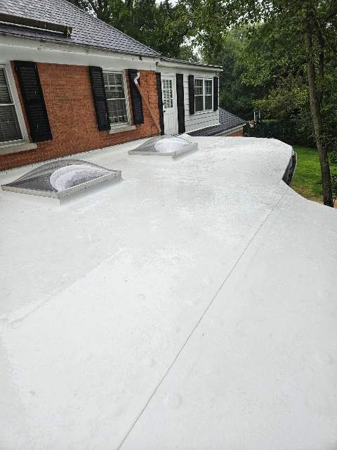 Flat Roof Replacement and Copper Gutter Installation by Custom Installations