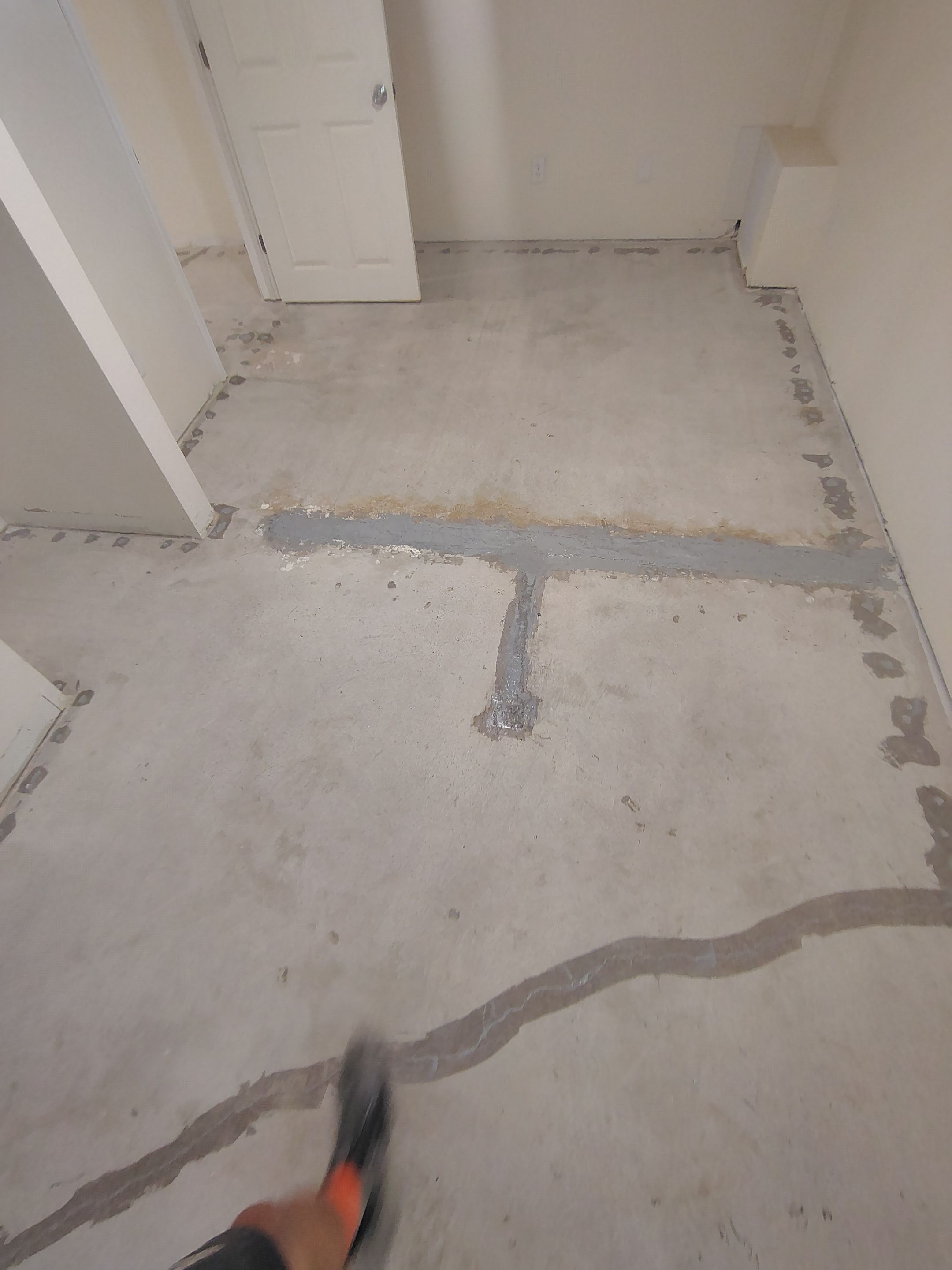Comprehensive Basement Concrete Floor Coating and Crack Repair in Sioux Falls by Select Painting, Coatings & Garage Cabinets