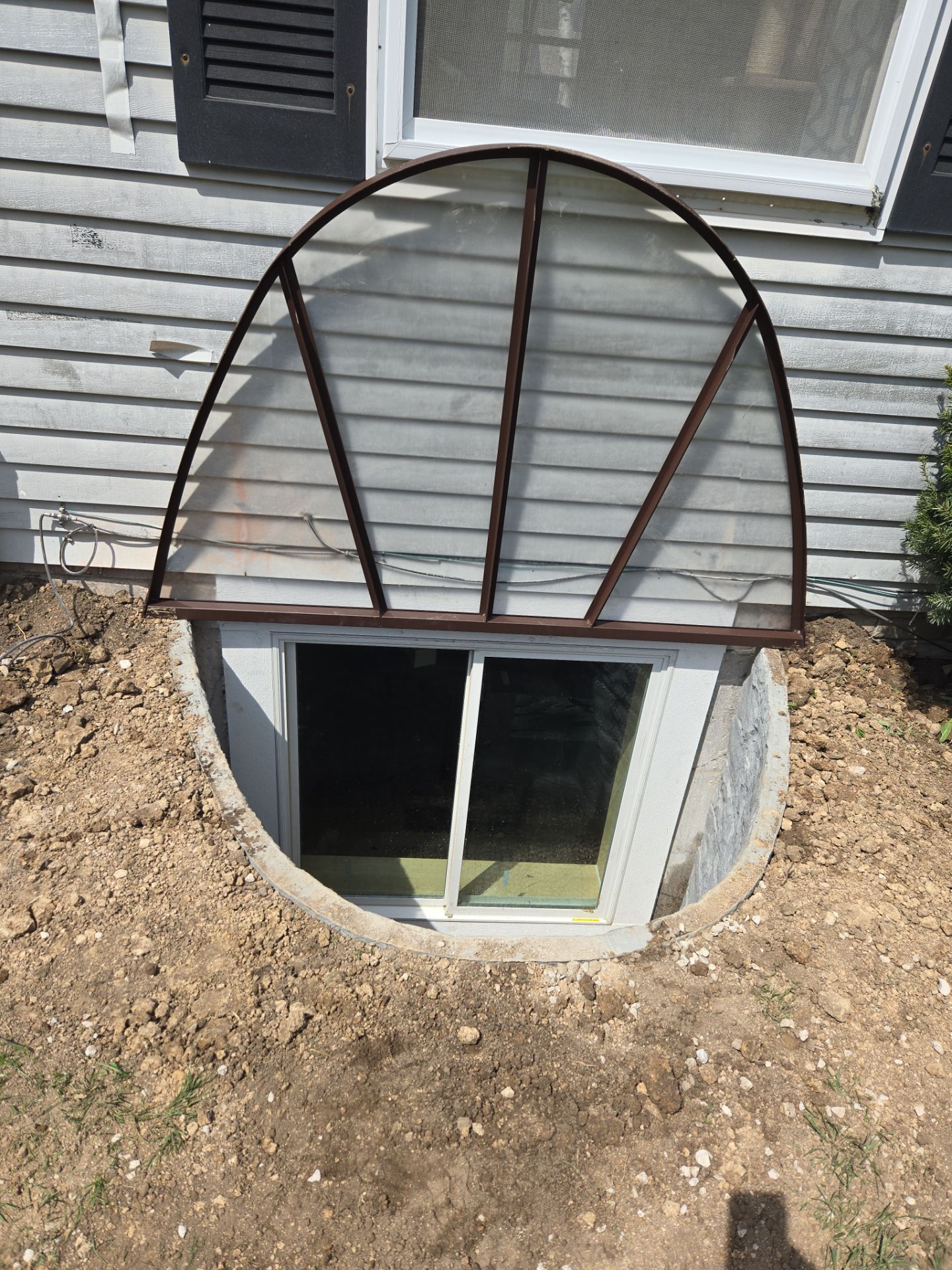 Egress Window Installation with a Premier Basement Egress Window Kit by Toledo Basement Repair