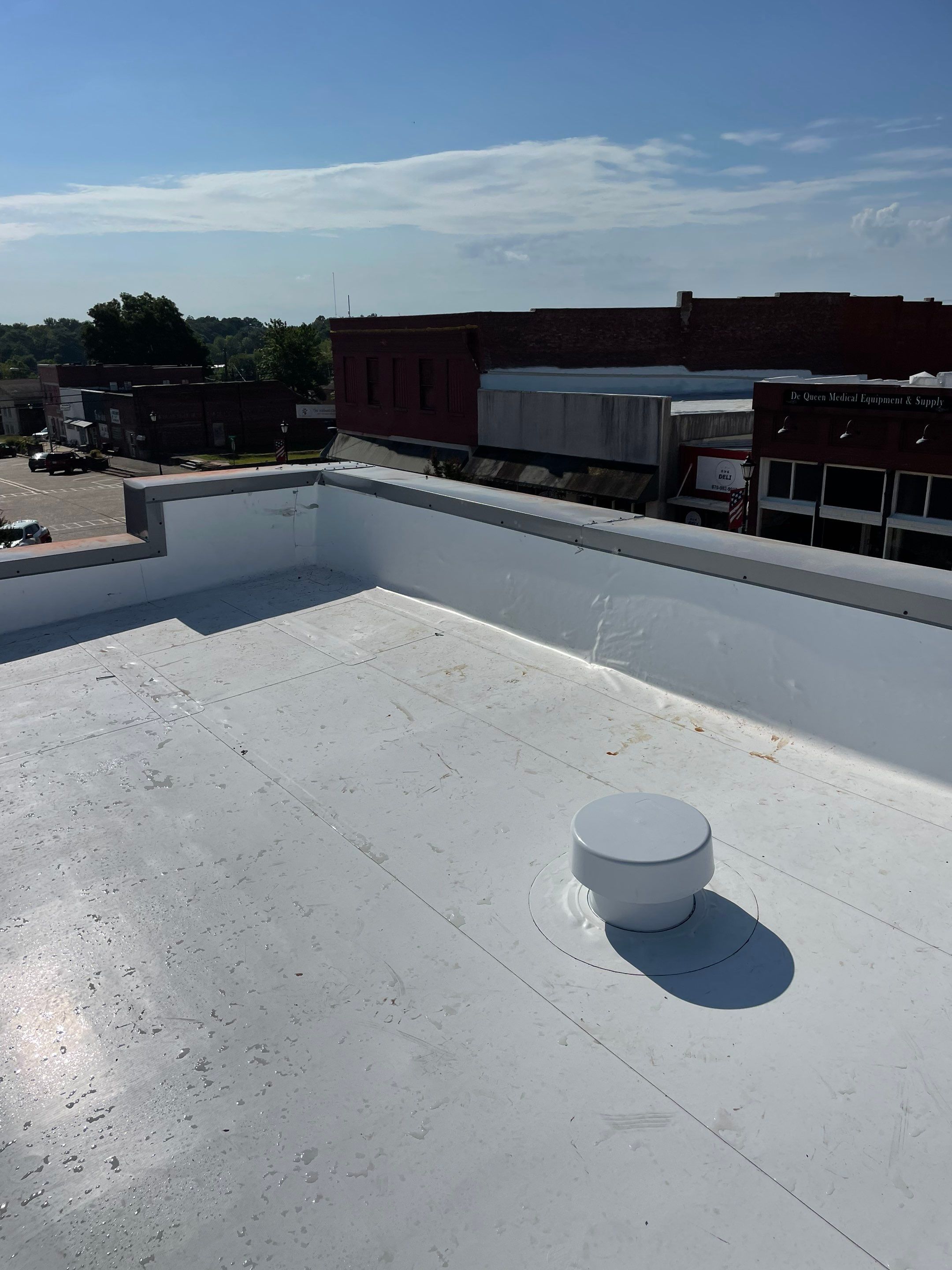 Commercial Roofing Installation in DeQueen, AR, using 50 mil PVC by Hostetler Roofing