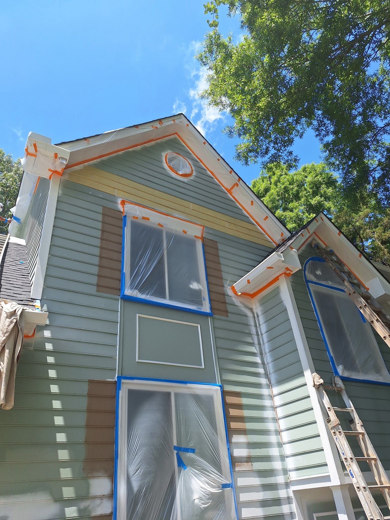Siding Replacement and painting by GonzalezPainters & Contractors Inc 
