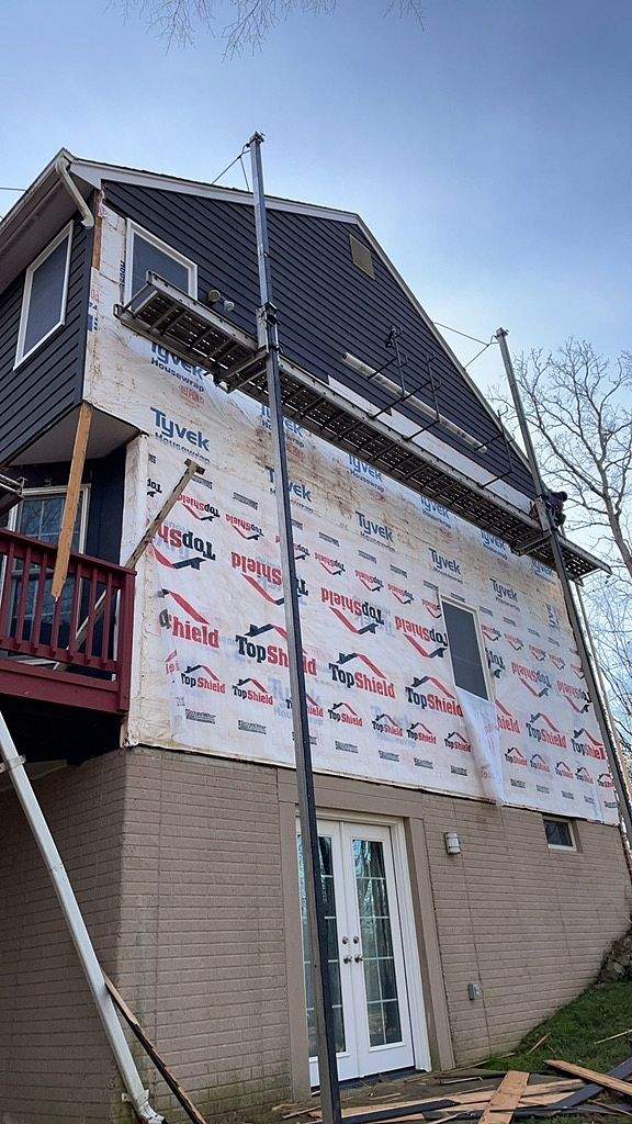 Siding Installation using James Hardie Siding- Cobblestone & Provia Signet Entry Door by Roof Right Inc