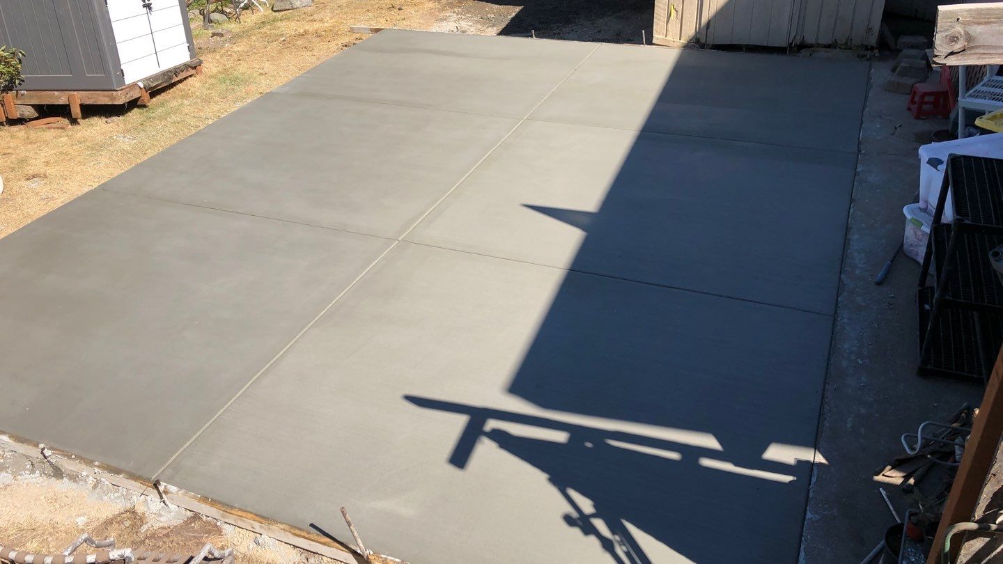 Oscar | Concrete Driveway  by Jireh Asphalt & Concrete Inc 