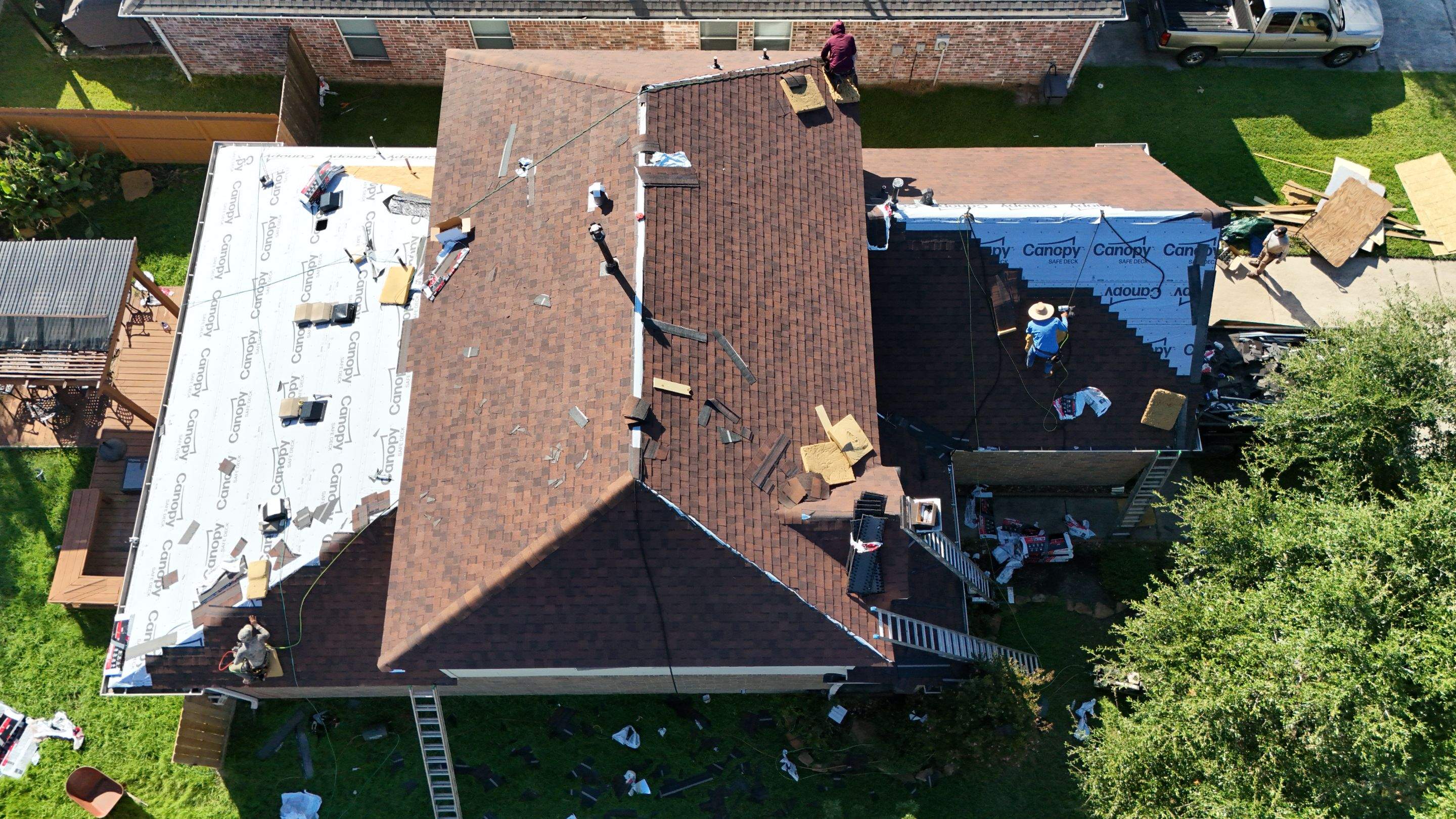 Full Roof Replacement in Warm Brown Tones — Spring, TX by PL Roofing & SB Roofing, LLC.