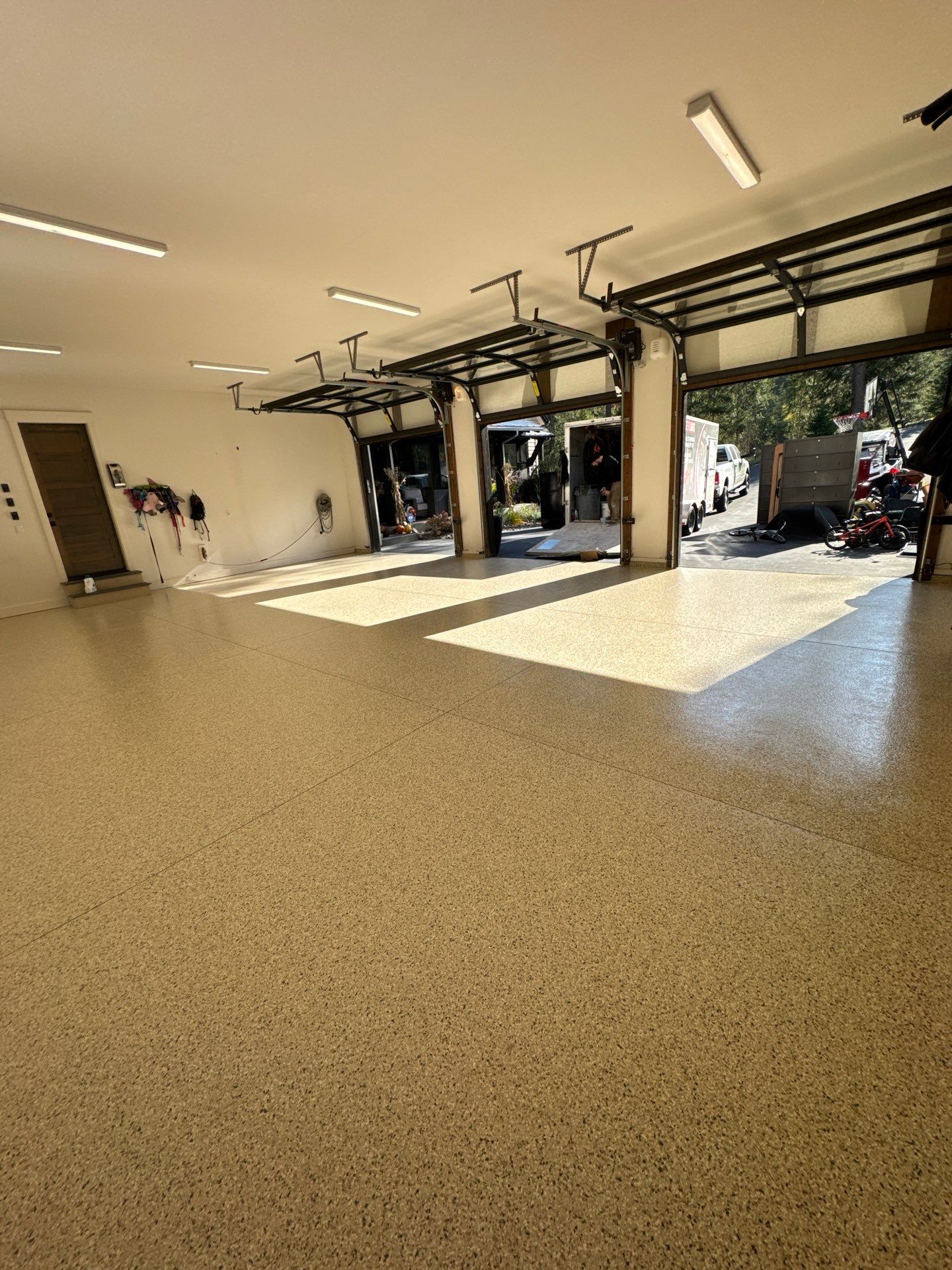 Driftwood Flake Garage Floor Transformation in Coeur d'Alene by Croc Coatings, LLC