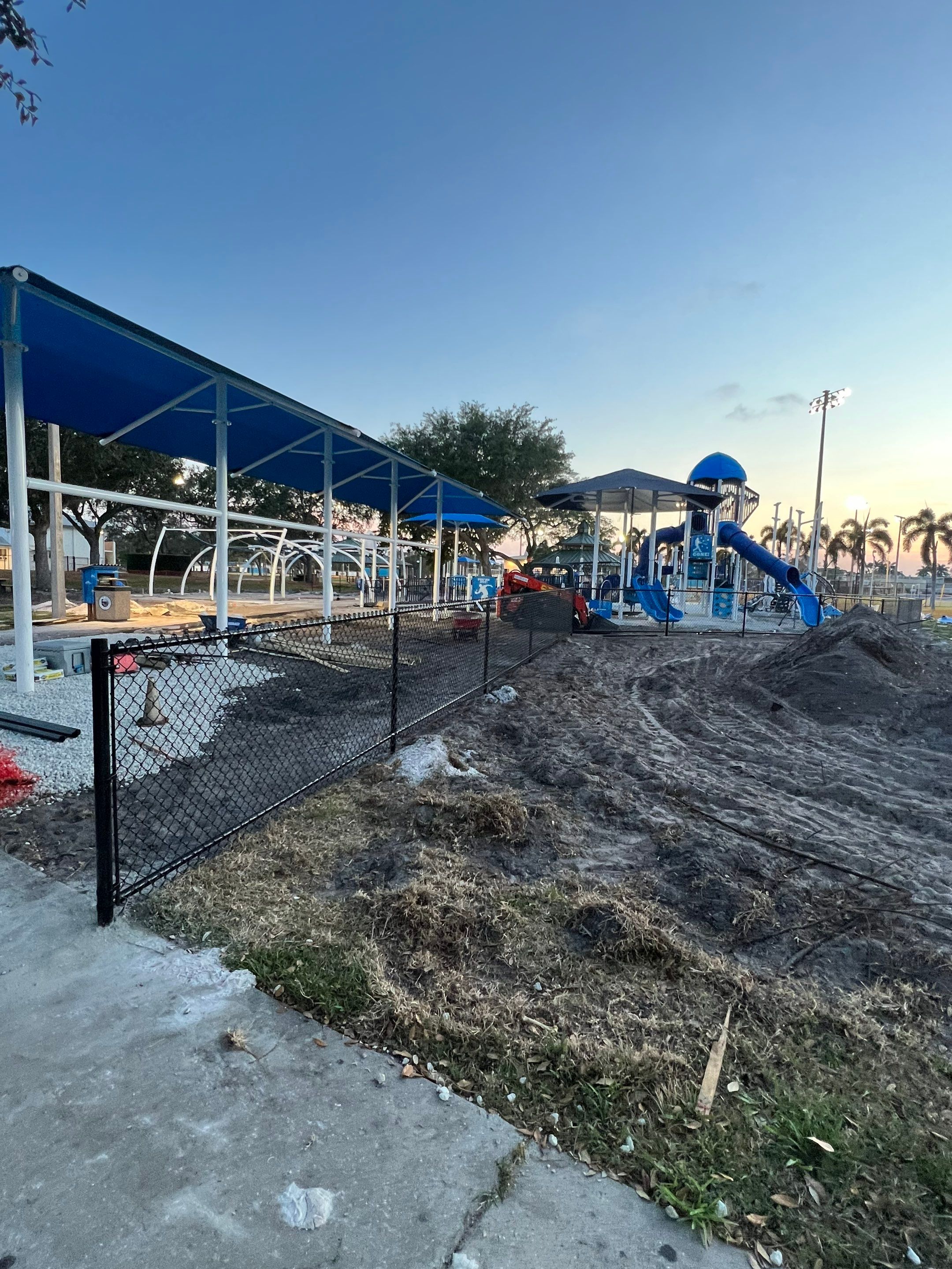 Vinyl Coated Chain-link fence for the City of Naples around Fleischmann Park Playground.  by Asap fence and gates, LLC