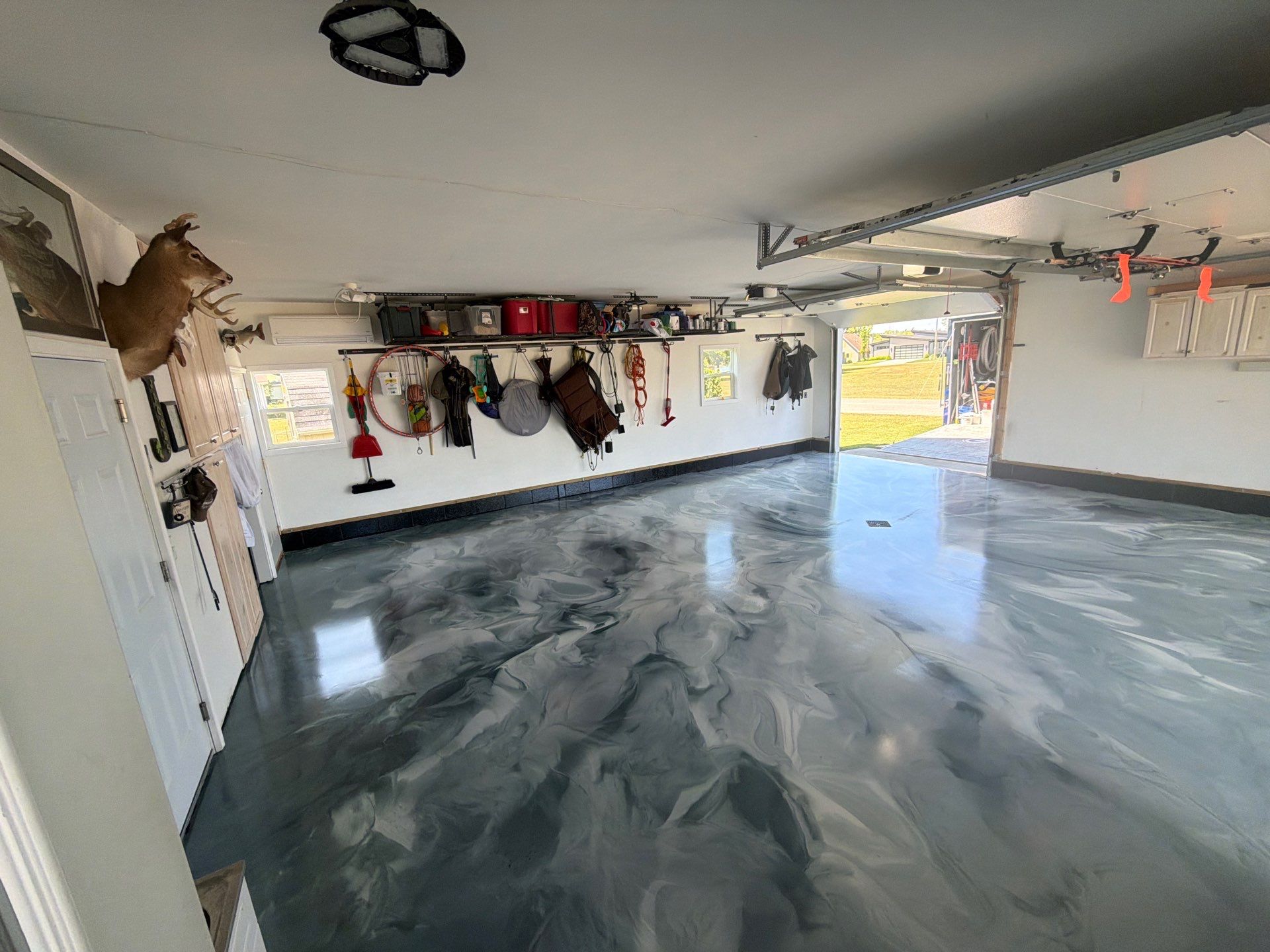Custom Metallic Epoxy Floor and Polished Countertop Installation in Mears by Gordon Painting