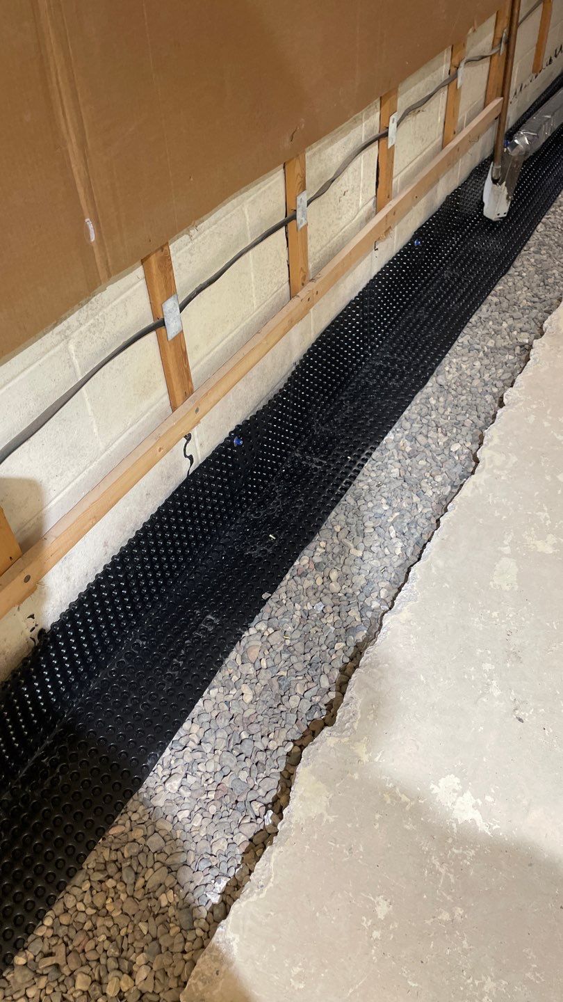 Drain Tile, Sump Pump & Buried Discharge in Columbia Heights by Waterproofing Northeast