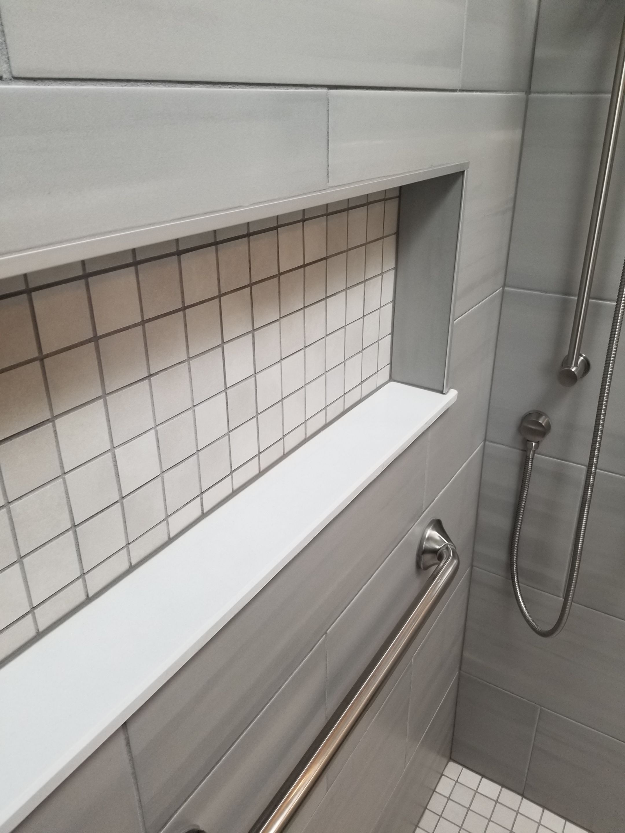 Remodel full bathroom new tile walk in shower plus 2nd half bath Powder room in Livonia, MI by Northwest Construction