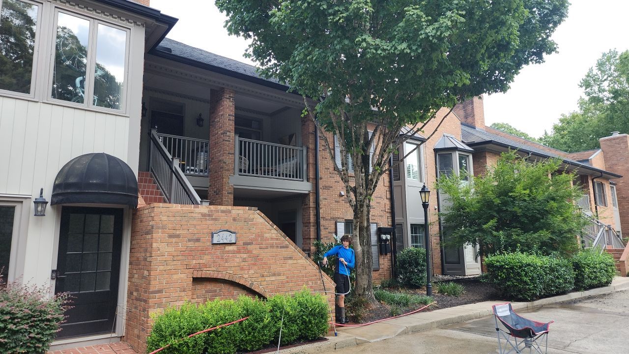 building clean using cleaner by Power Wash Masters LLC