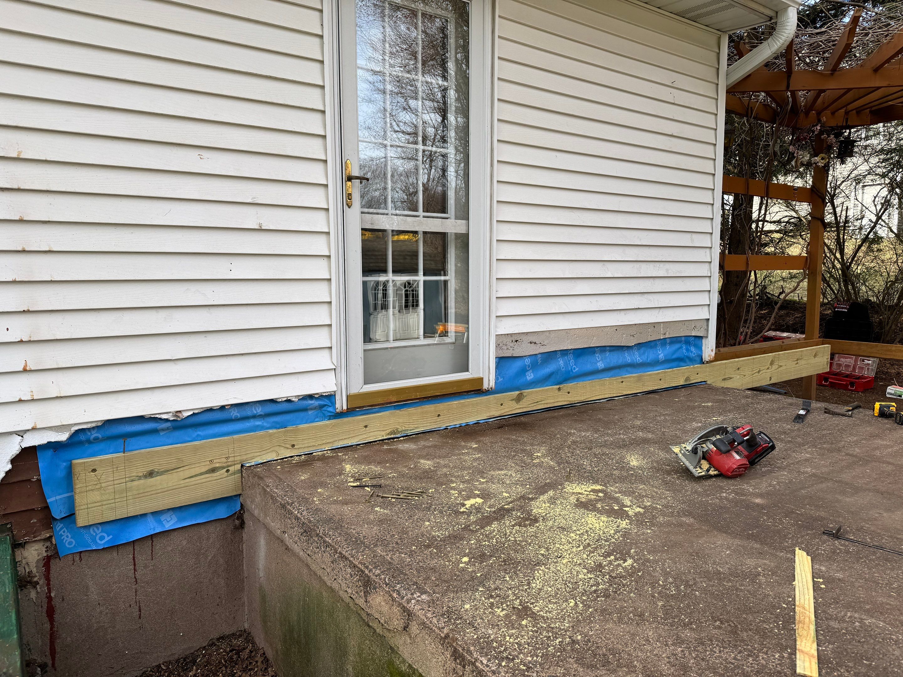 Replacement deck with Trex Transcend Tiki Torch deck boards and matching cocktail rail. by DiGiorgi Roofing and Siding Inc