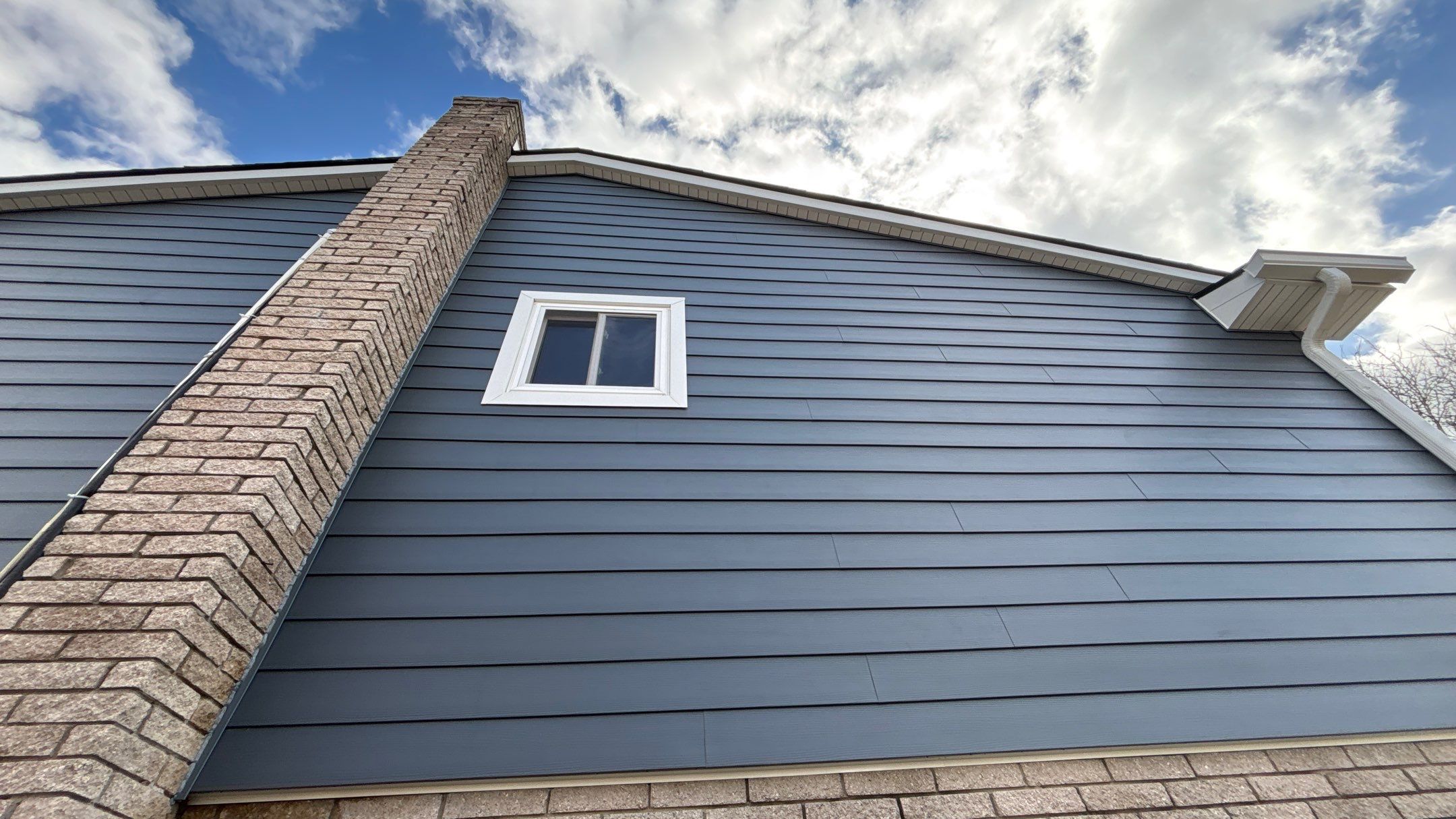 Siding Replacement using Alside Midnight Blue by 180 Contractors