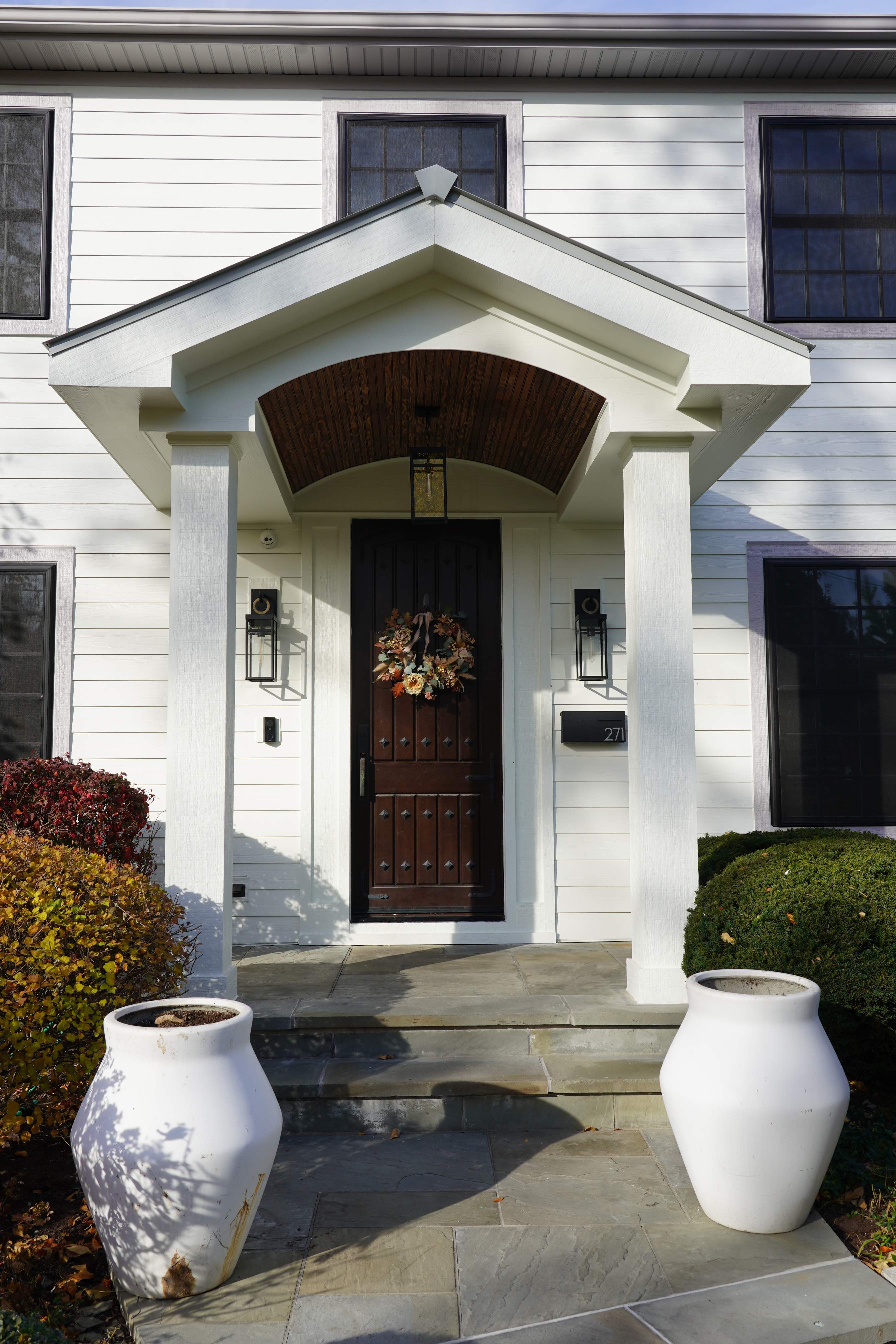 Exterior Renovation in Elmhurst with James Hardie Siding and Windows by Great American Exteriors