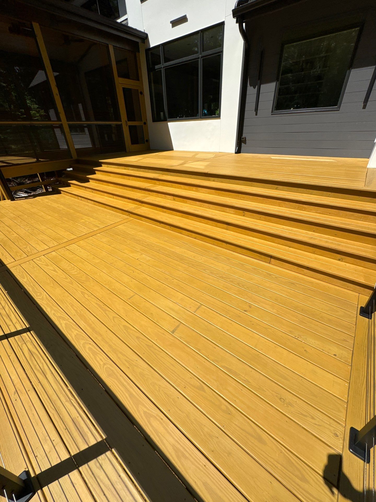 Porch and Deck staining  by GonzalezPainters & Contractors Inc 