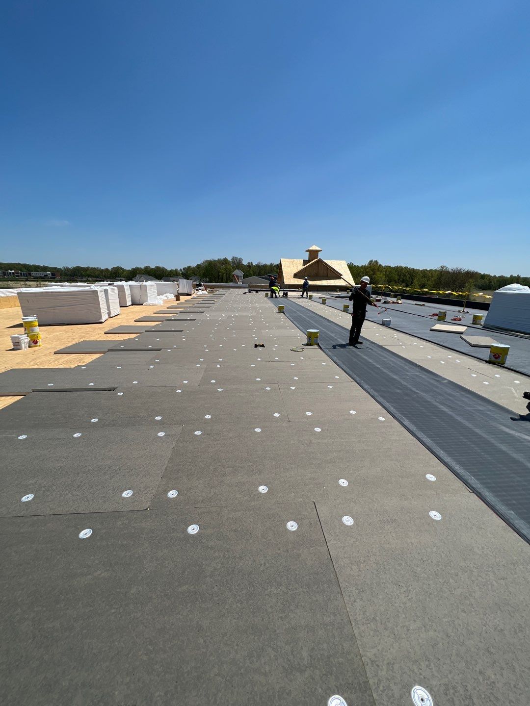 Commercial Roofing Installation using 60 mil rubber roof  by Nitro Roofing and Construction