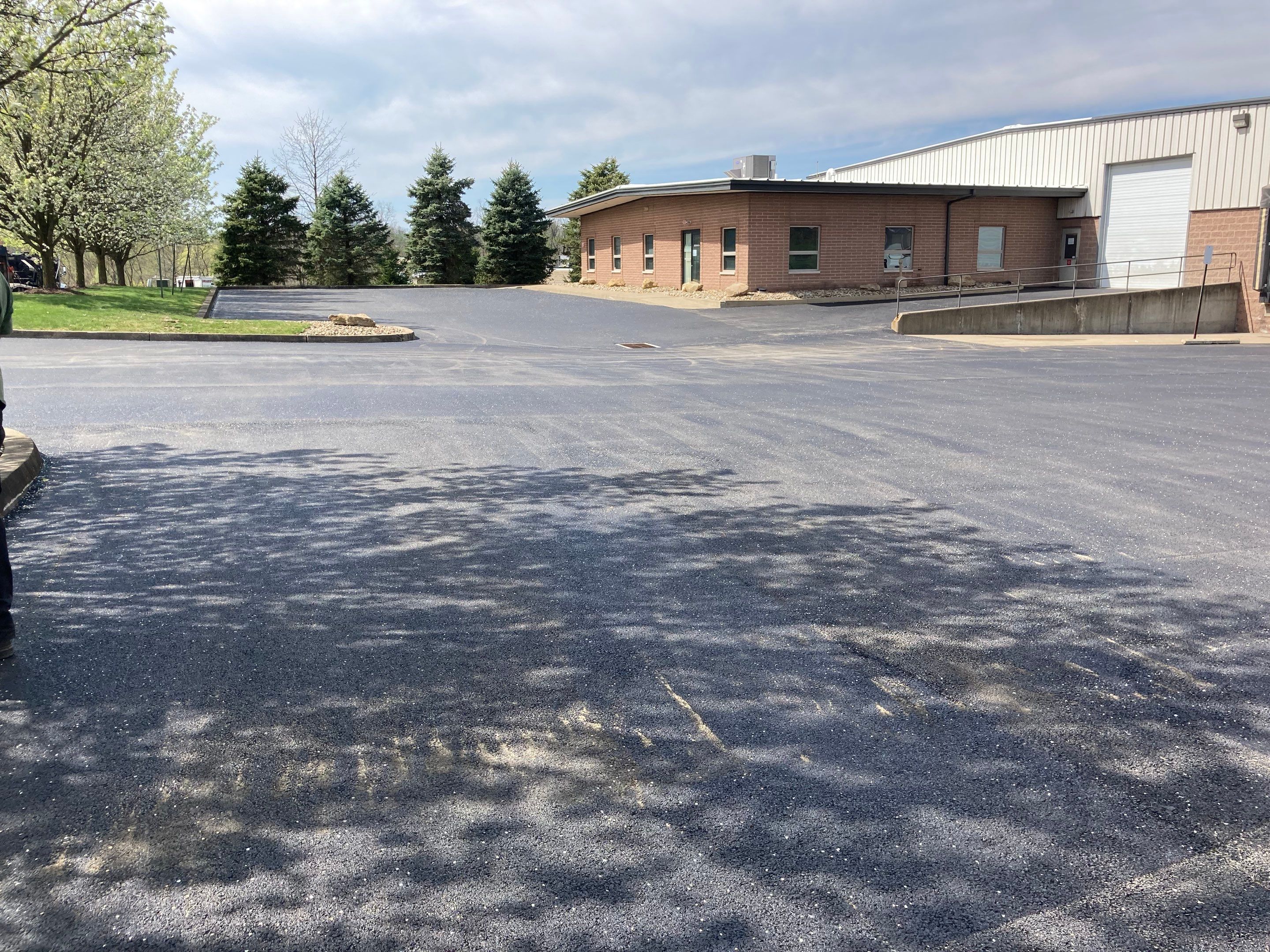 Asphalt Resurface Commercial Park Lot using asphalt by Brant's Asphalt