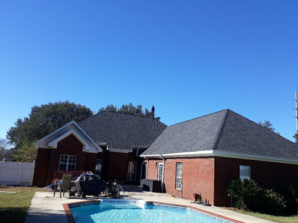 Residential Roofing Installation using Roof Replacement by American Roofing & Construction LLC