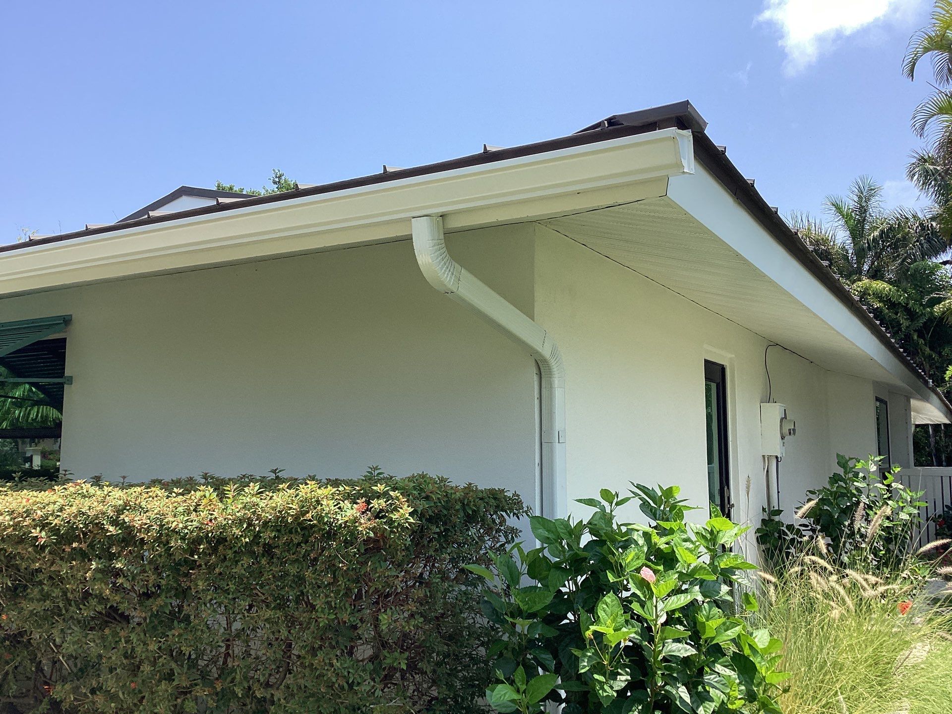 White Seamless Gutters and Downspouts in Sarasota FL by Gutter Professors