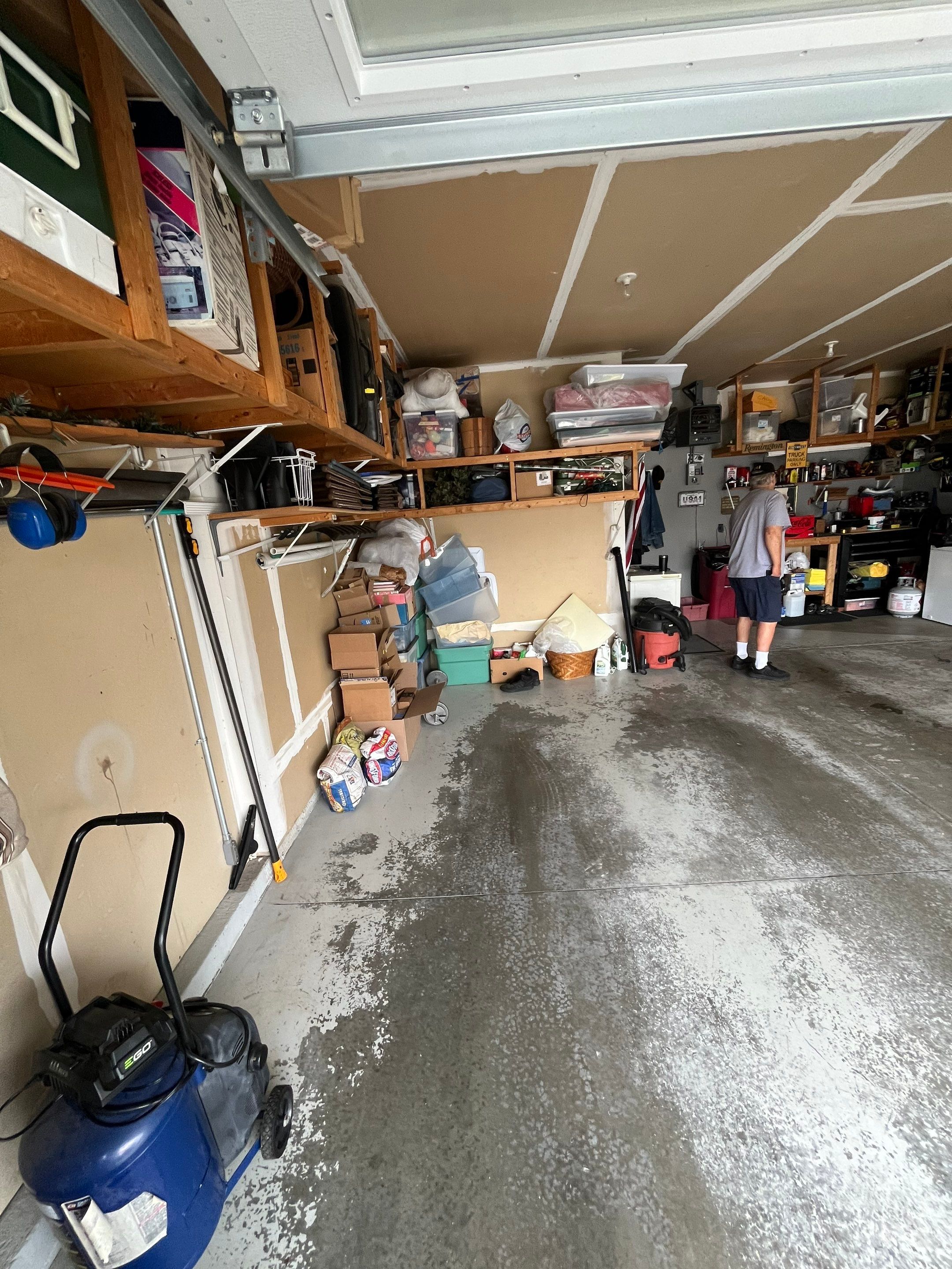Nightfall Grey Speckled Epoxy Garage Floor Coating in Sioux Falls by Select Painting, Coatings & Garage Cabinets