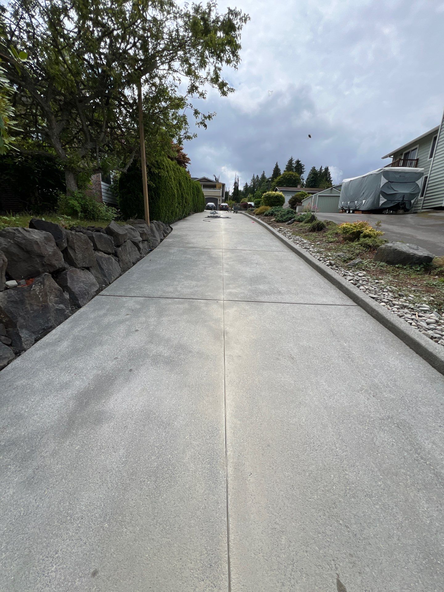 Concrete Driveway Makeover w/ Asphalt Patch | Everett  by Jireh Asphalt & Concrete Inc 
