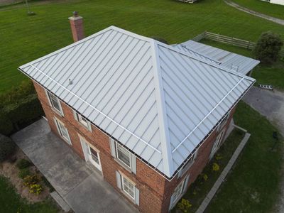 Standing Seam Metal Roofing using 16" Standing Seam Panels by Jay Carter Roofing & Sheet Metal