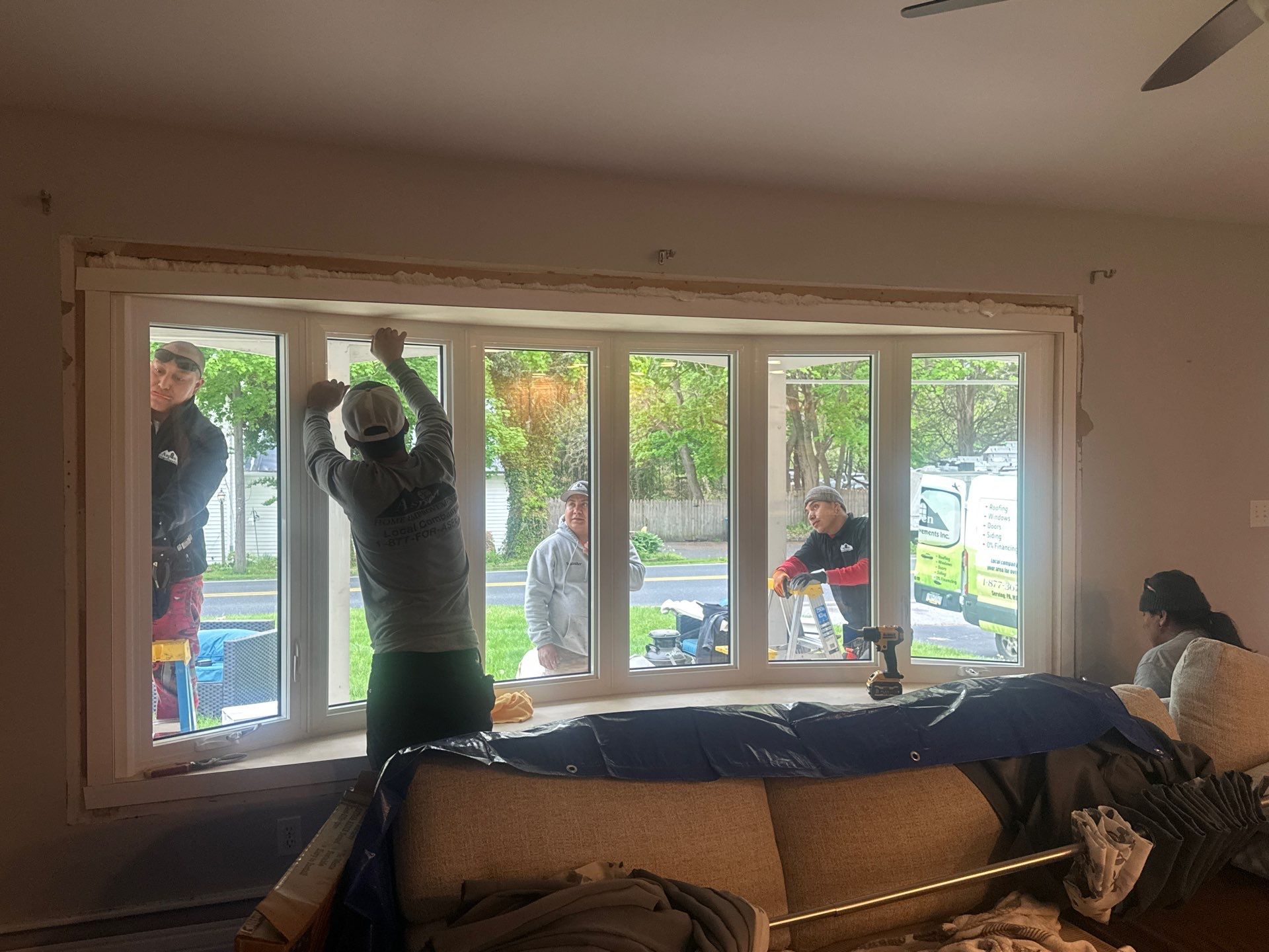 Double Hund Windows and Bow by Aspen Home Improvements