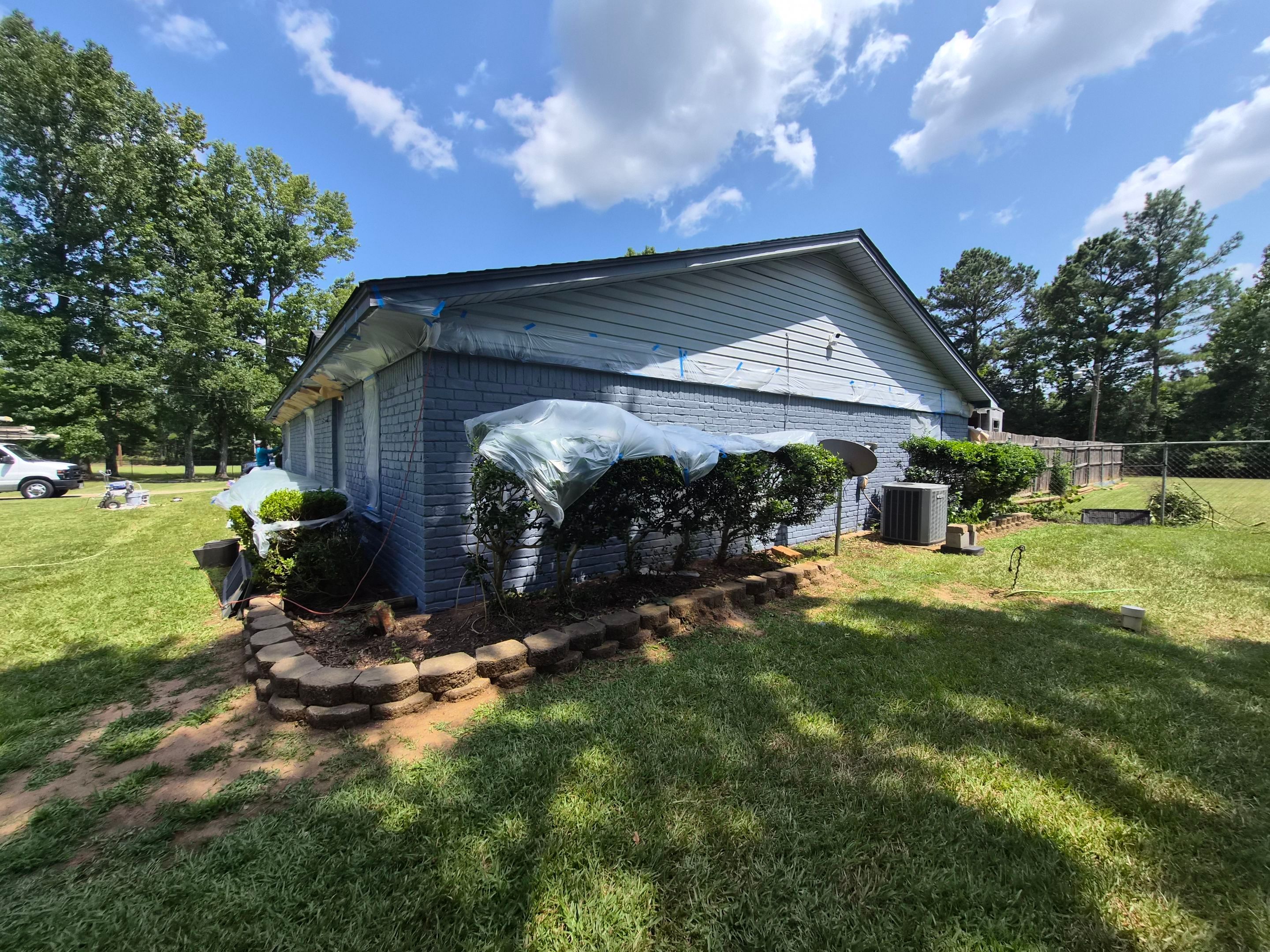 Exterior Refresh Brick Painting Job in Overton, TX by Quality Coats Painting
