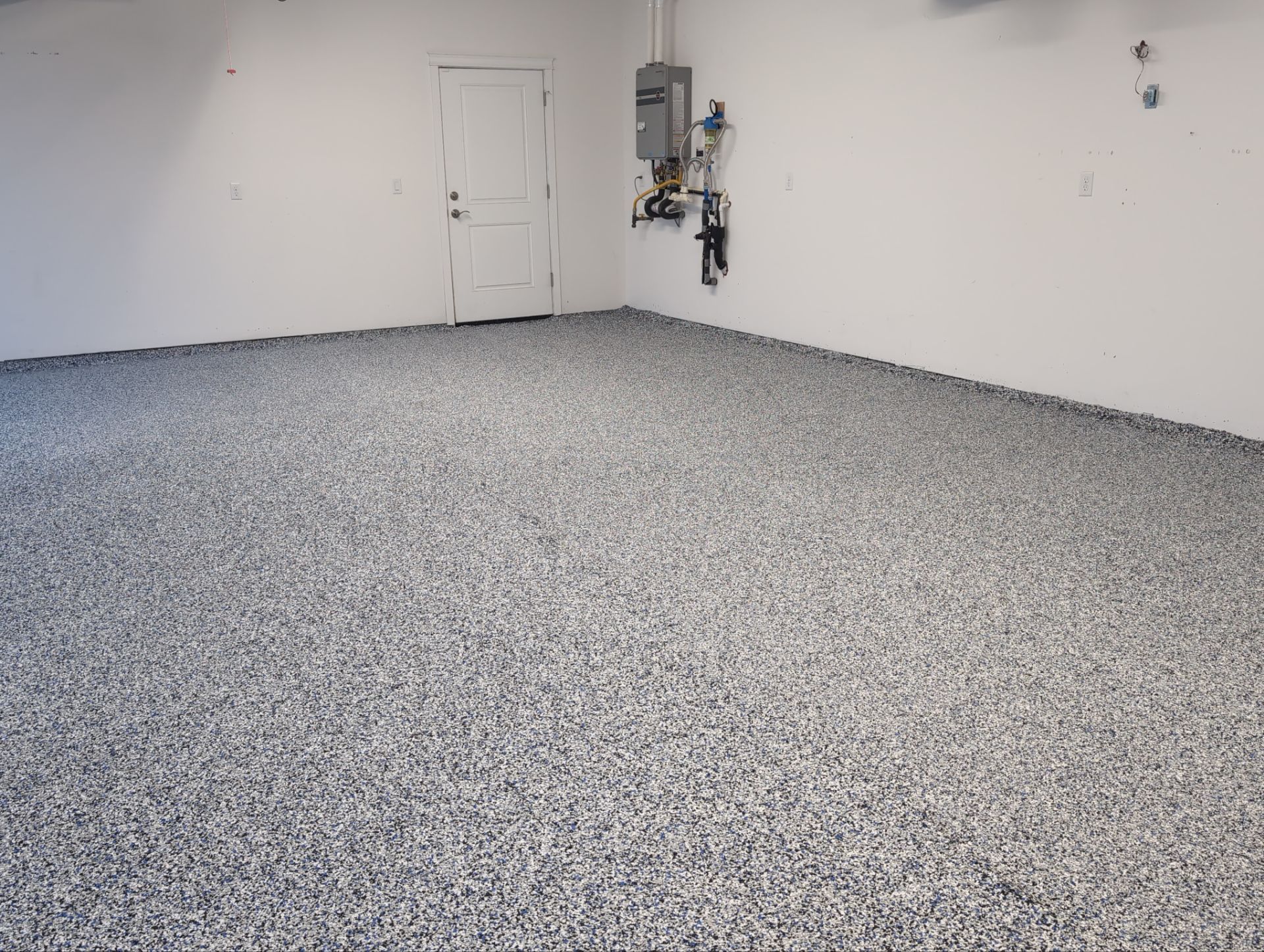 Garage Transformation using Domino with Blue by Croc Coatings, LLC