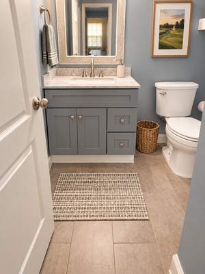 Modern Bathroom Refresh with Custom Vanity & Contemporary Finishes by Remodel Now
