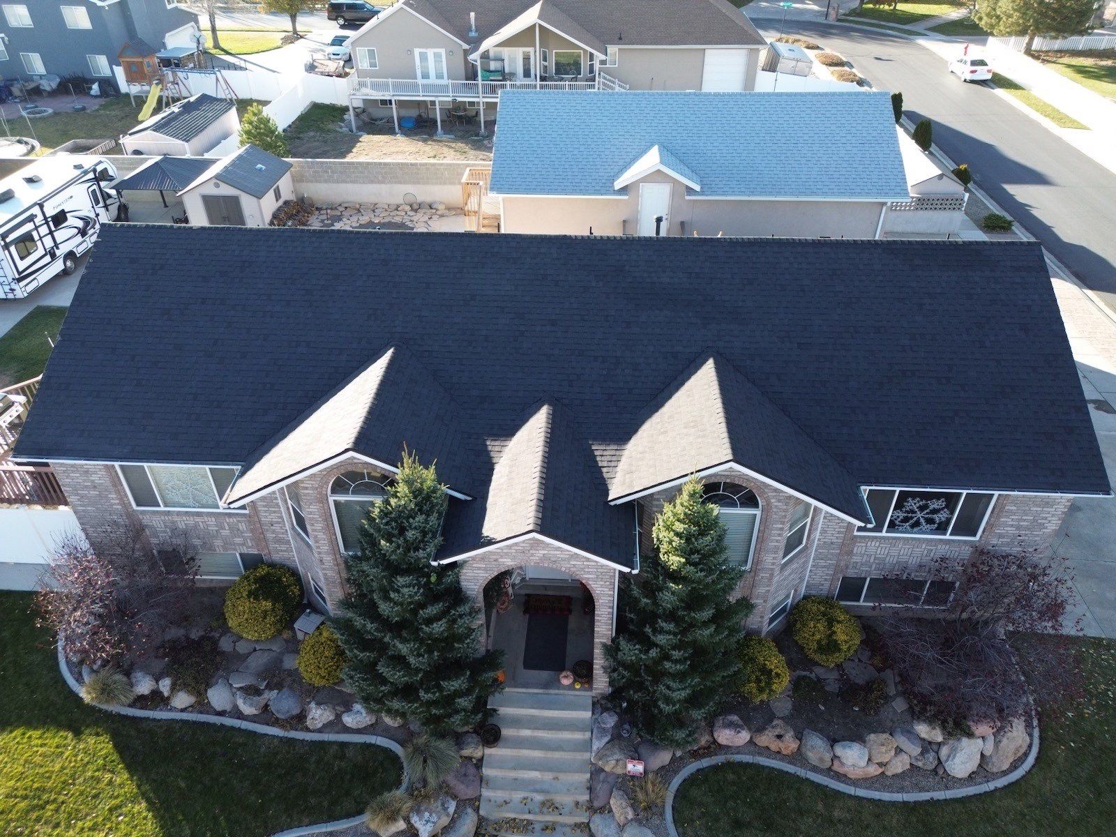 Onyx Black Shingles by Reimagine Roofing