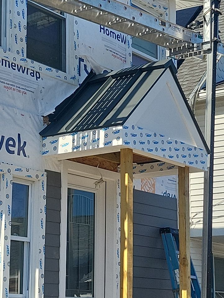 Siding Installation using Hardie Plank Aged Pewter by A Plus Exterior