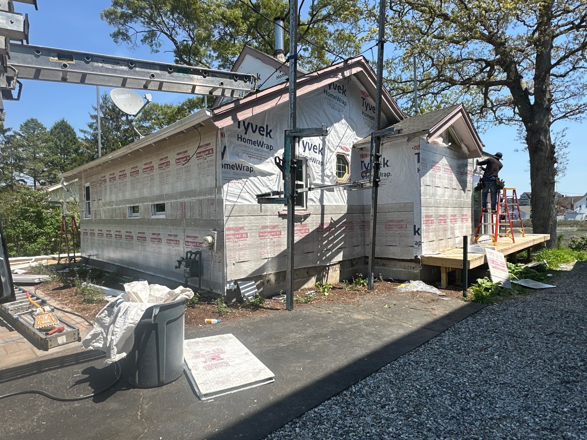 Milford Exterior Renovation Featuring Custom Siding and Wood Deck Installation by A Plus Exterior