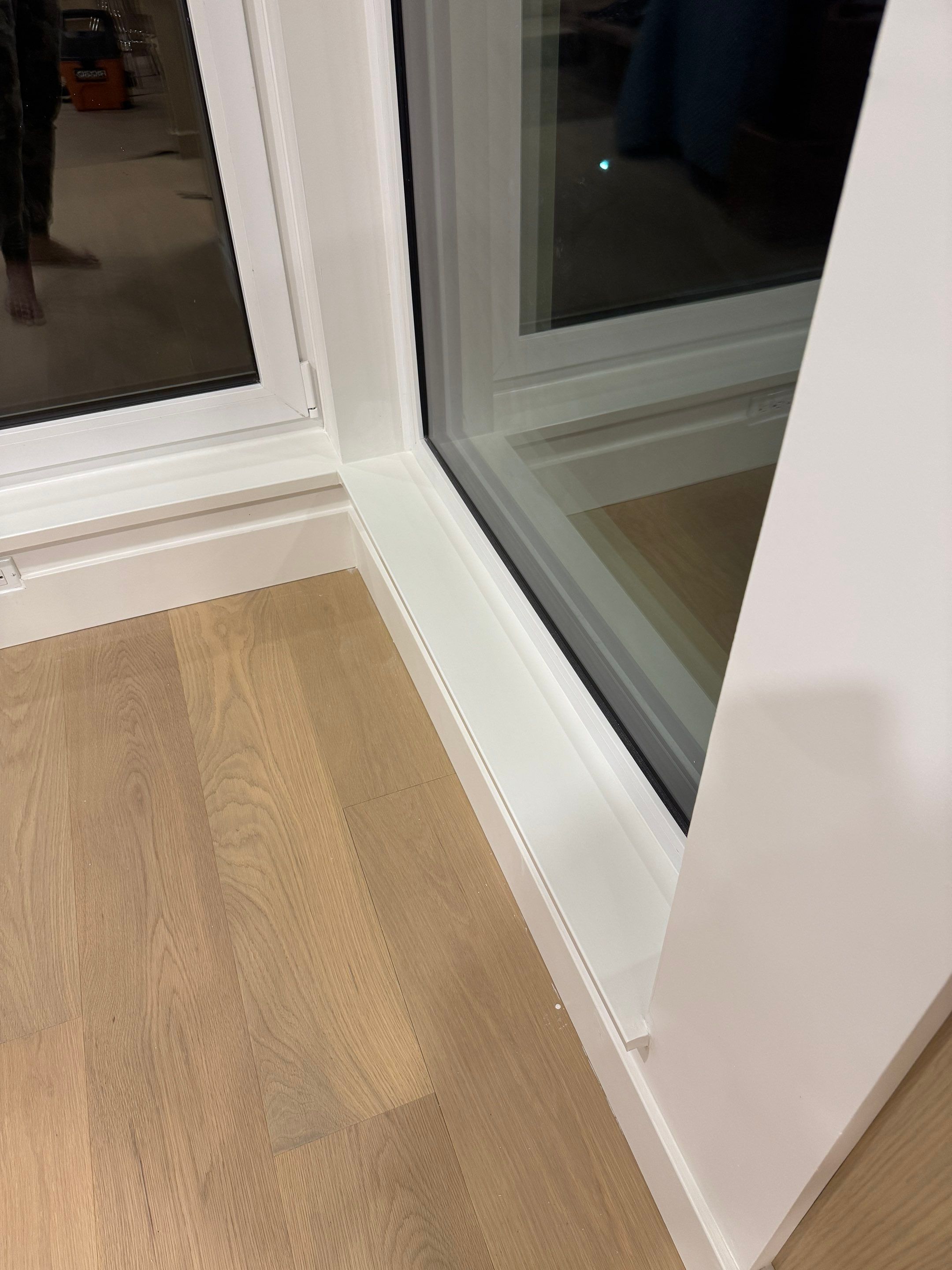 West Vancouver Custom Millwork: Heat Pump Trim & Window Finishing by YVR Construction Group