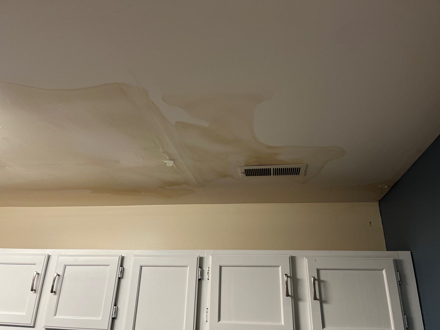 Interior Water Damage Affecting the Garage and Kitchen  by ANR Restoration