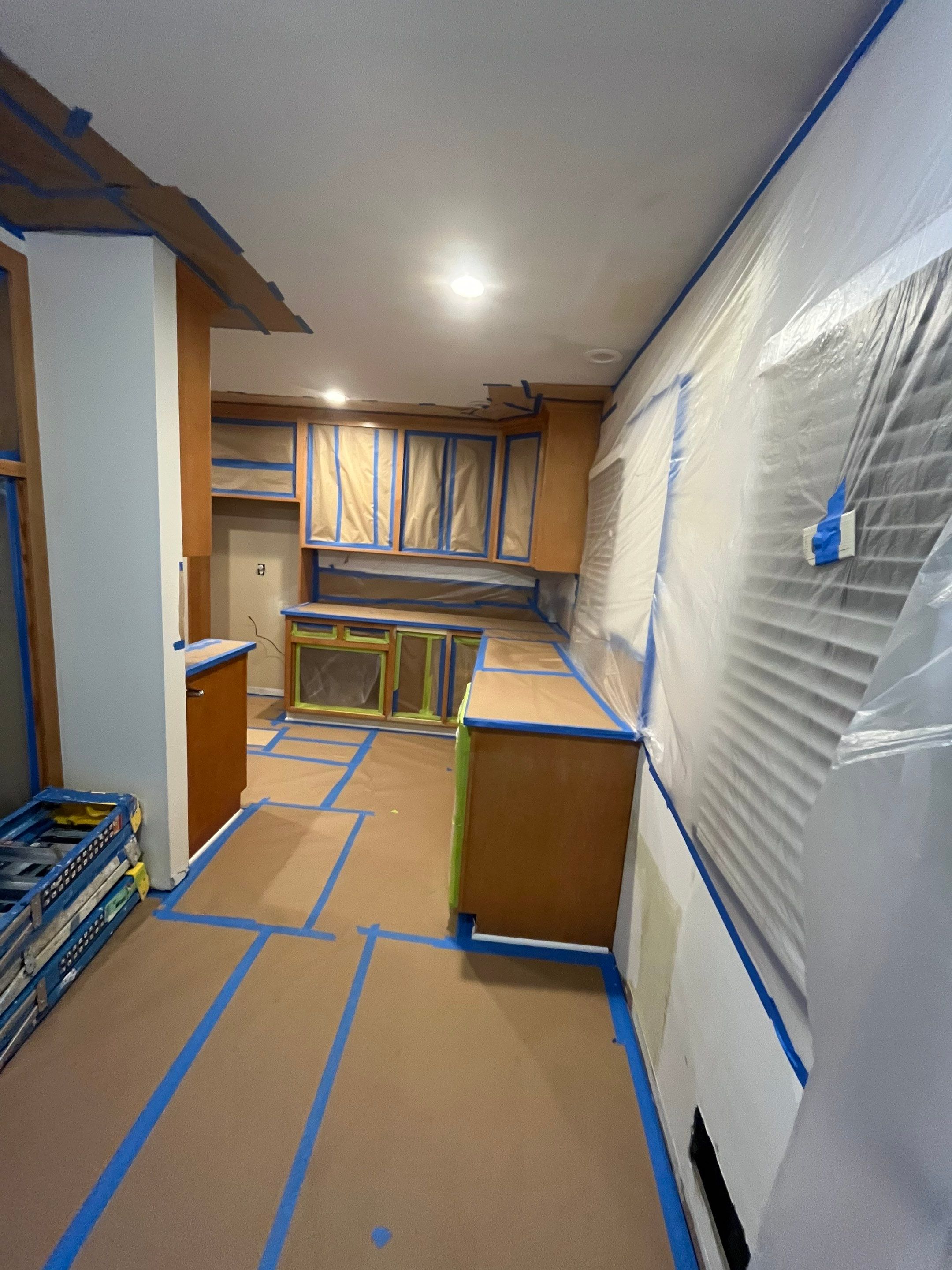 Elegant Transformation: Stained Cabinets Revamped with Sherwin-Williams Juniper by Cougar Painting