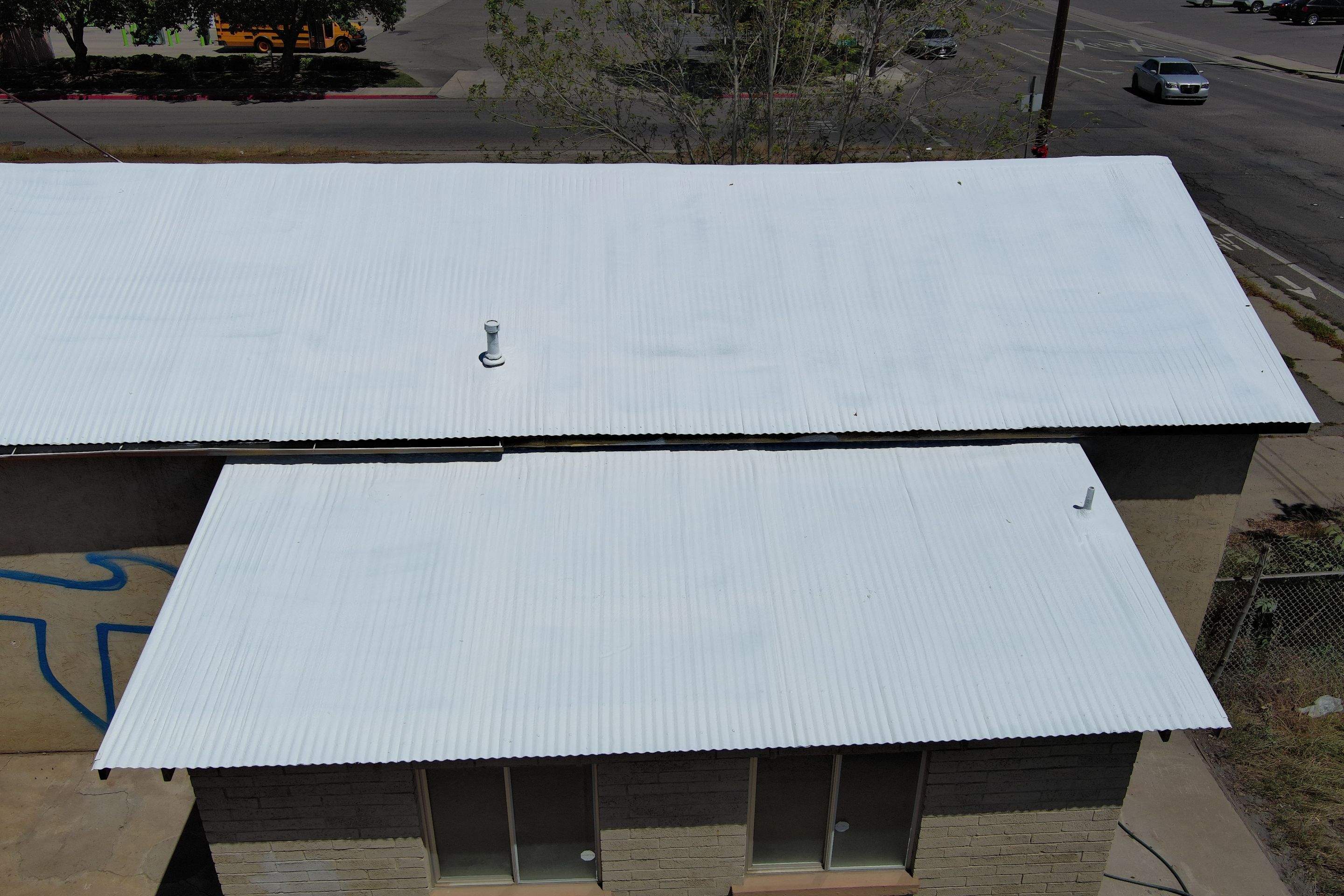 Spray foam and coatings using Conklin Benchmark/PUMA XL by Straight Edge Roofing Inc