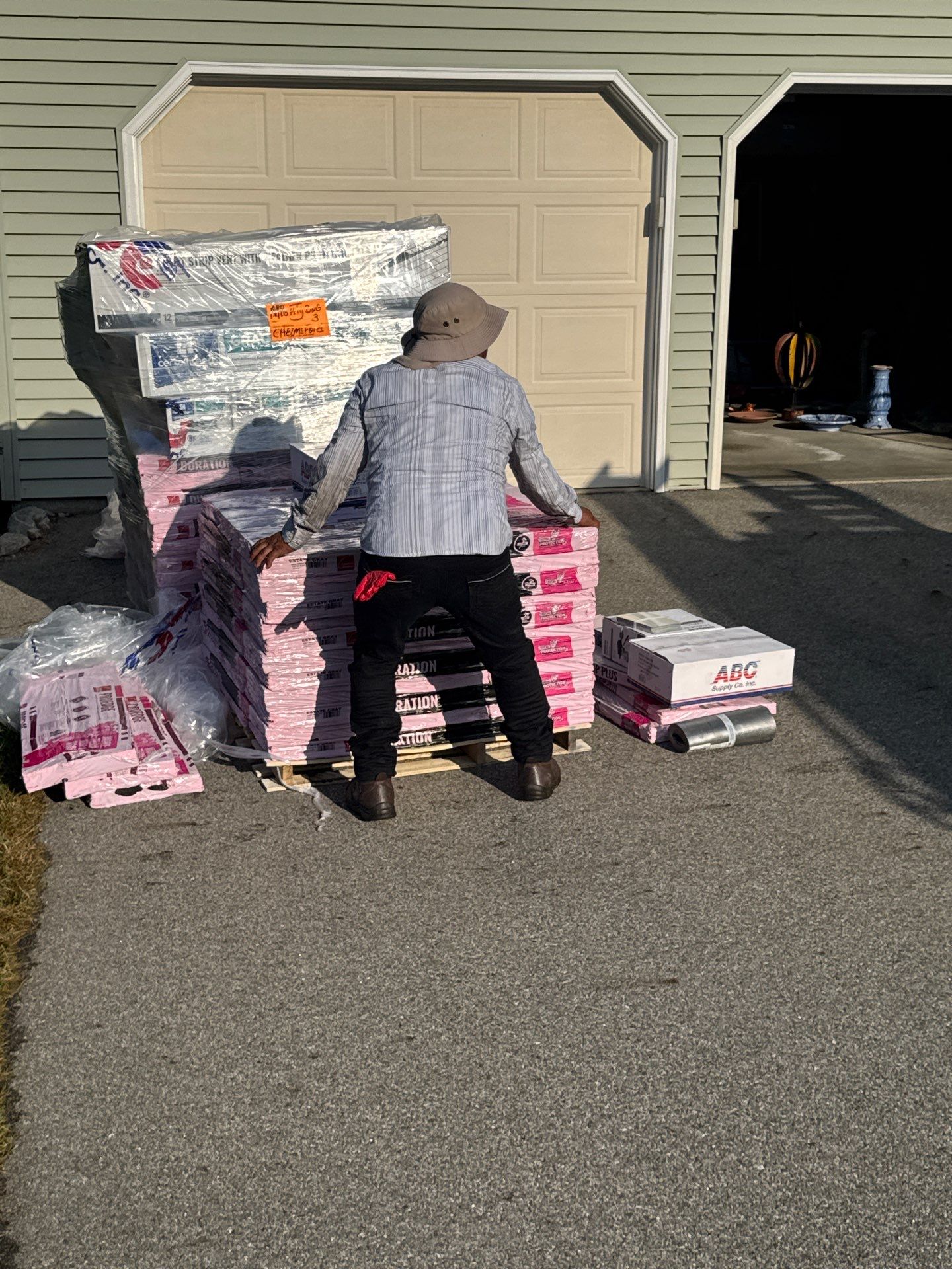 Complete Roof Replacement with Chimney Flashing, Gutter Guard System, and Vinyl Siding Repairs by Mighty Dog Roofing of Greater Middlesex County