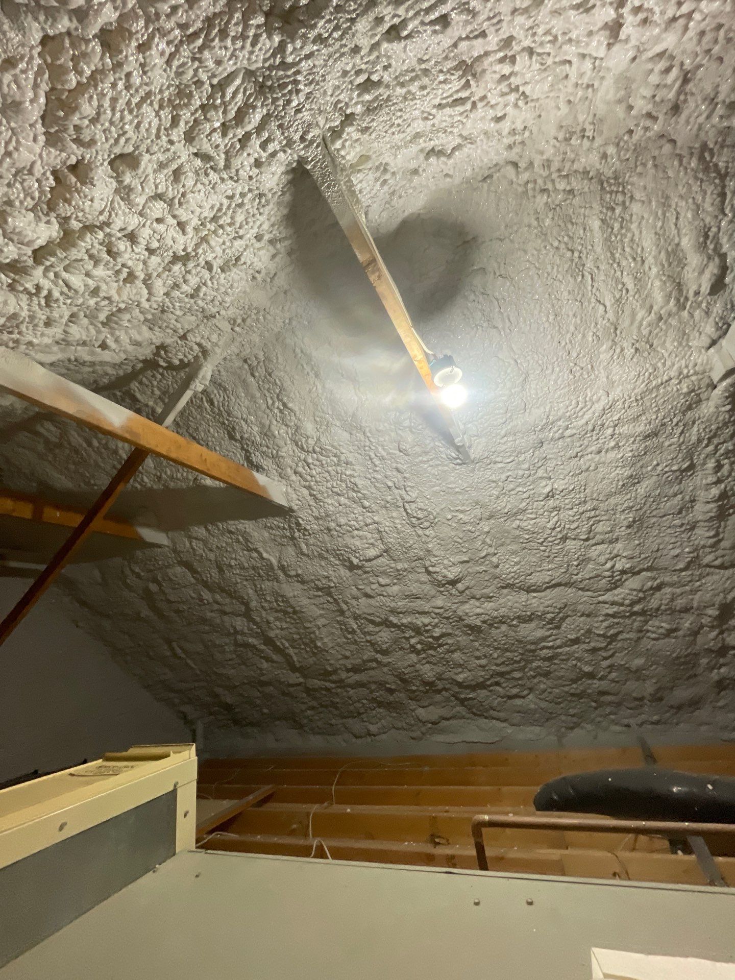 Attic Insulation using open cell spray foam by NYS Foam & Energy