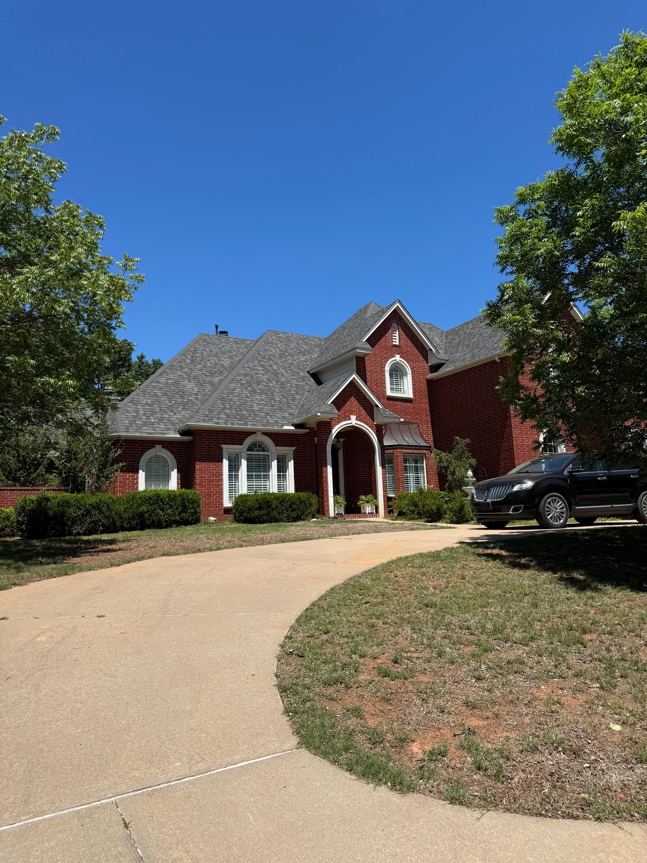 Owens Corning - Williamsburg Gray by Frontline Roofing and Construction