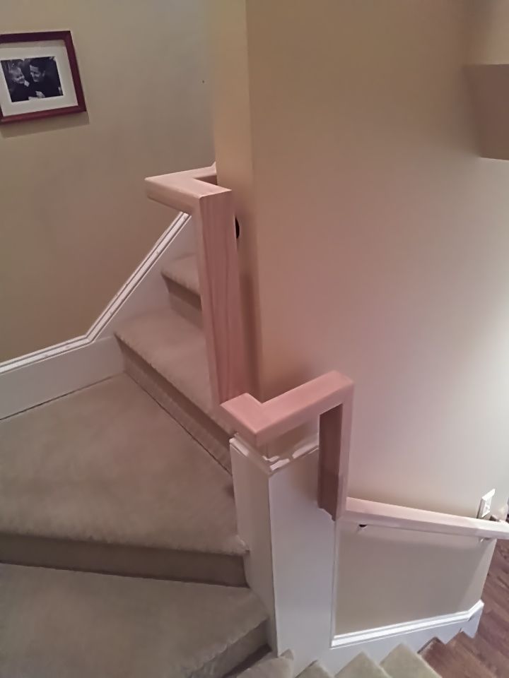 Stairway Installation using Red oak modern railings by House Custom Carpentry, LLC