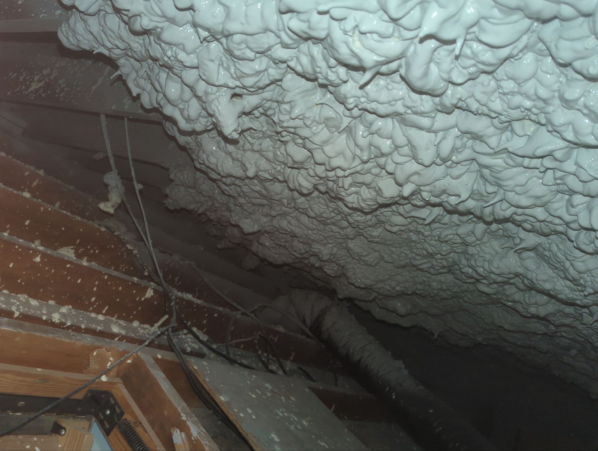 Attic Retrofit using open cell spray foam by NYS Foam & Energy