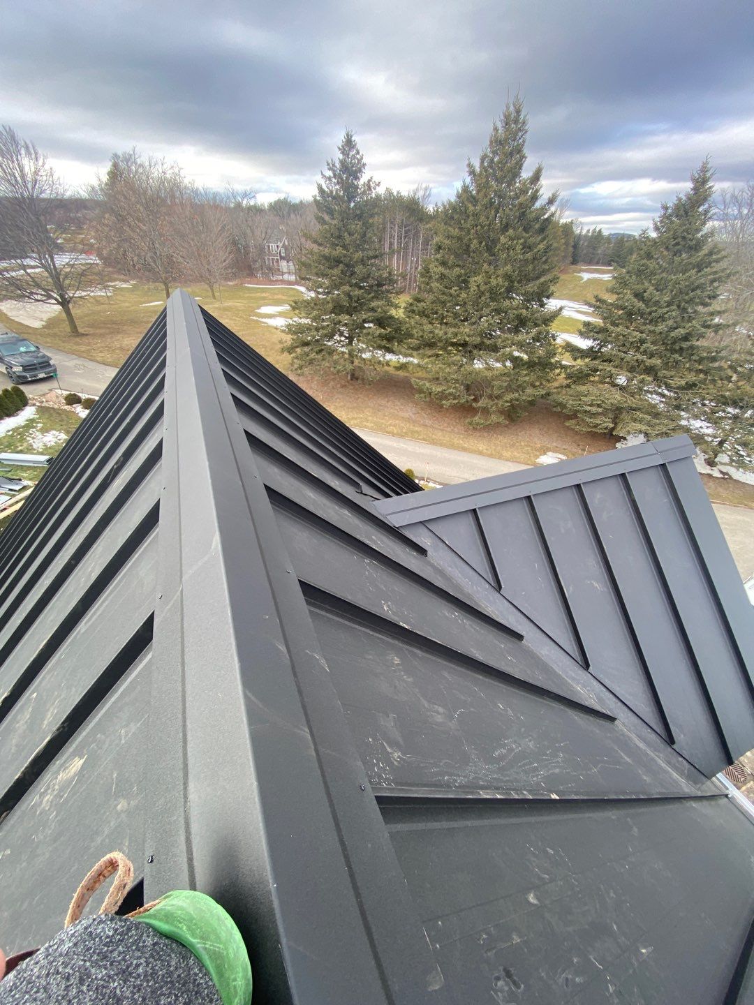 Residential Roofing Installation using 24 Ga Standing Seam Metal by Jay Carter Roofing & Sheet Metal