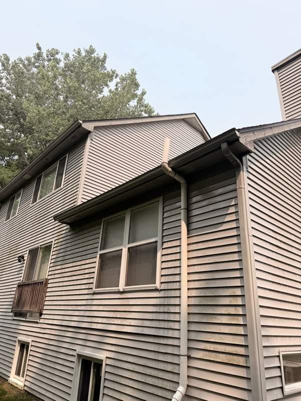 Exterior Siding and Wood Trim Restoration in Ypsilanti by Top Shelf Painter