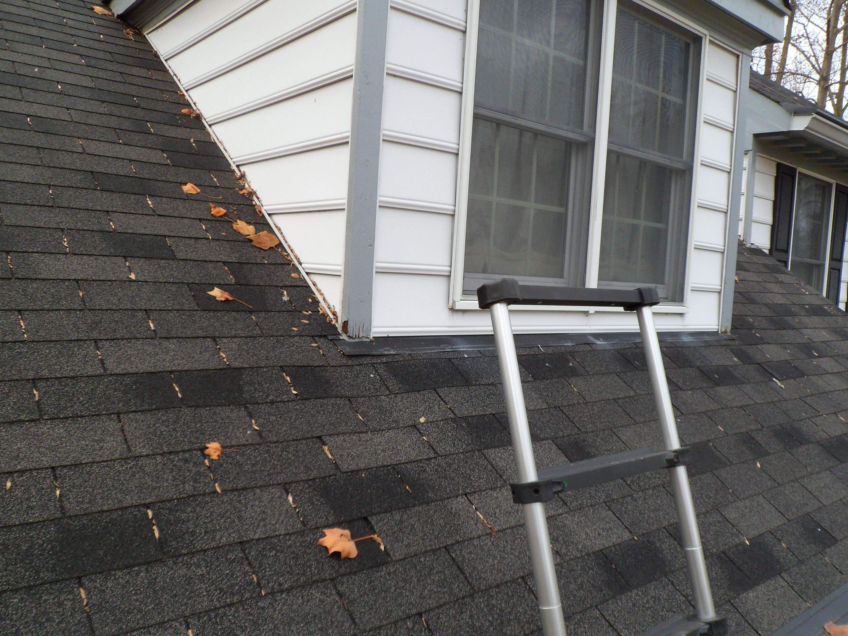 Residential Roofing Installation using Charcoal Black by Alpha Design Services