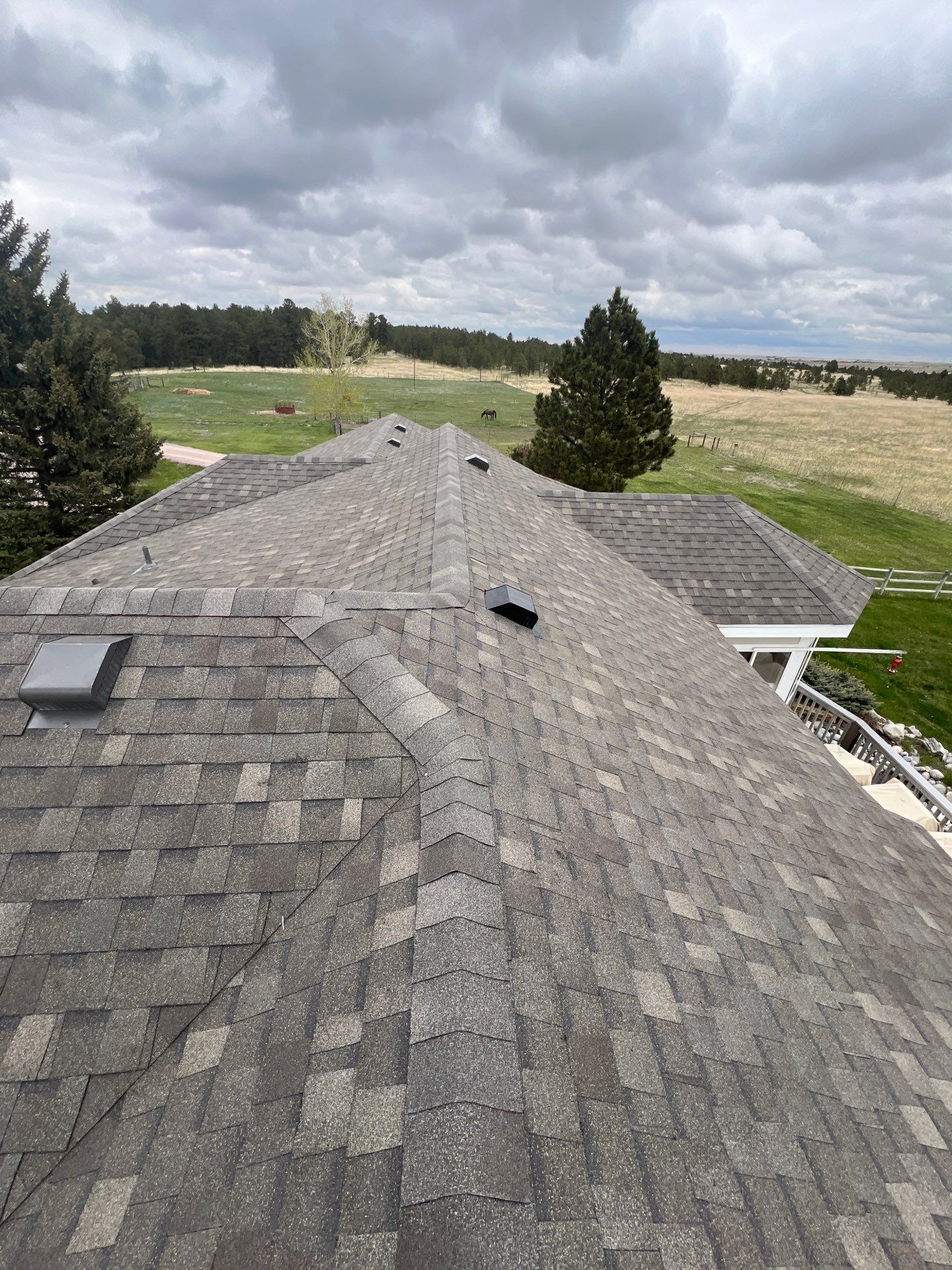 Residential Roofing Installation using Atlas Pinnacle Impact Weathered Wood by Blue Peaks Roofing LLC 