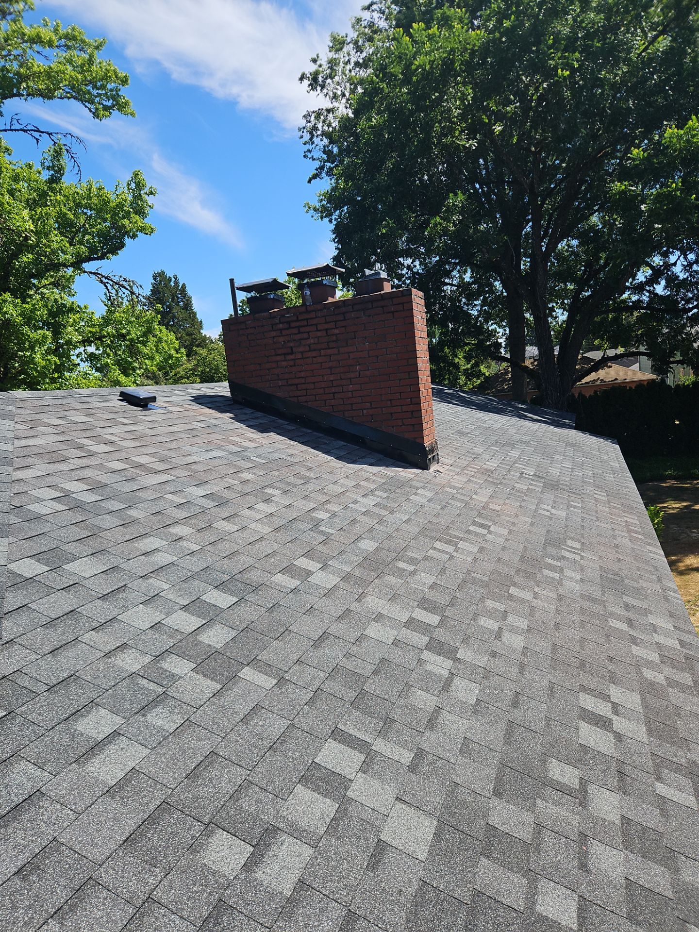 Residential Roofing Installation using IKO Dynasty (Color: Summit Grey) by Orezona Building & Roofing Company, Inc.
