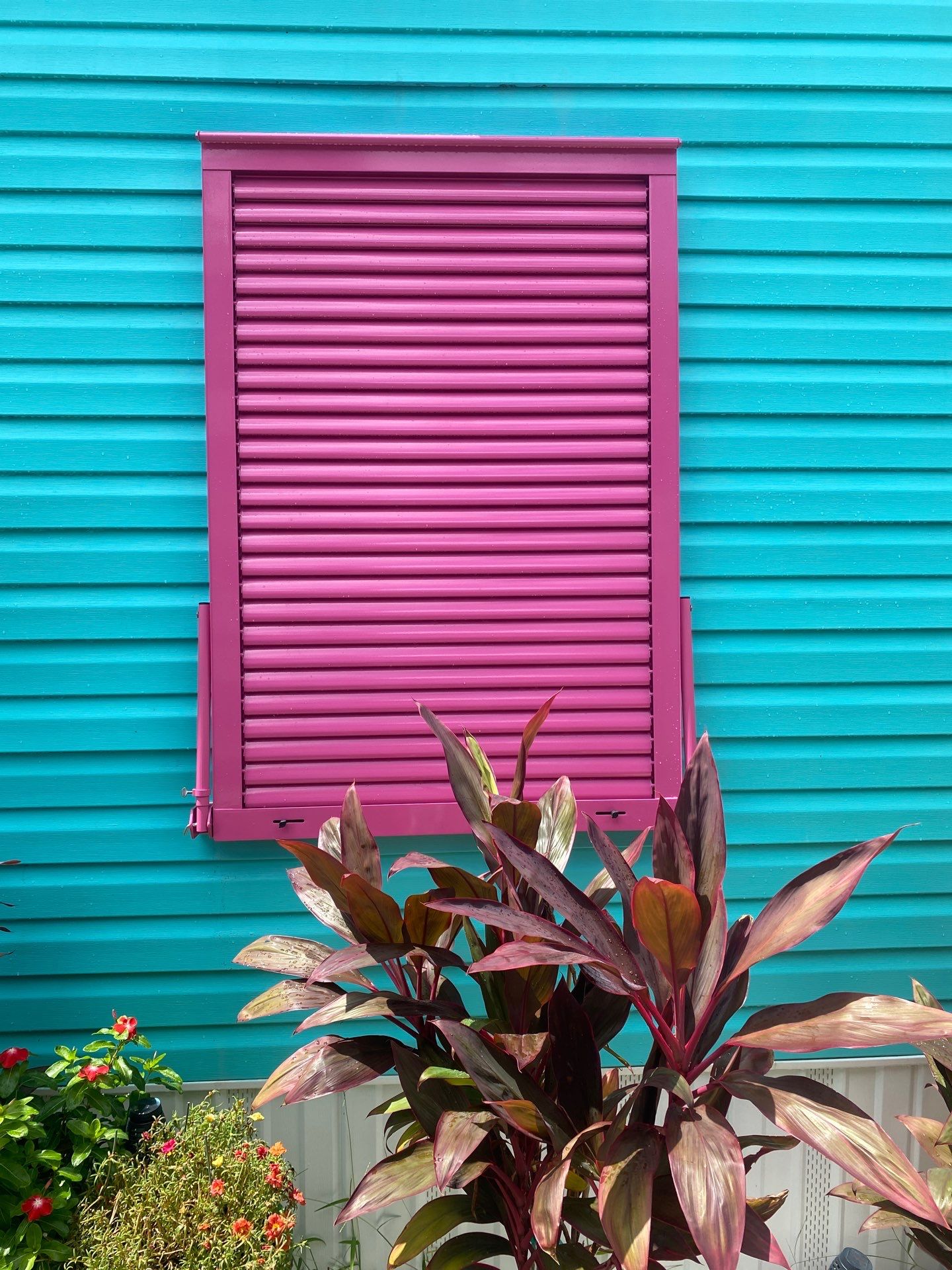 Impact Bahama Shutters in Heather Violet by Smart Guard Shutters